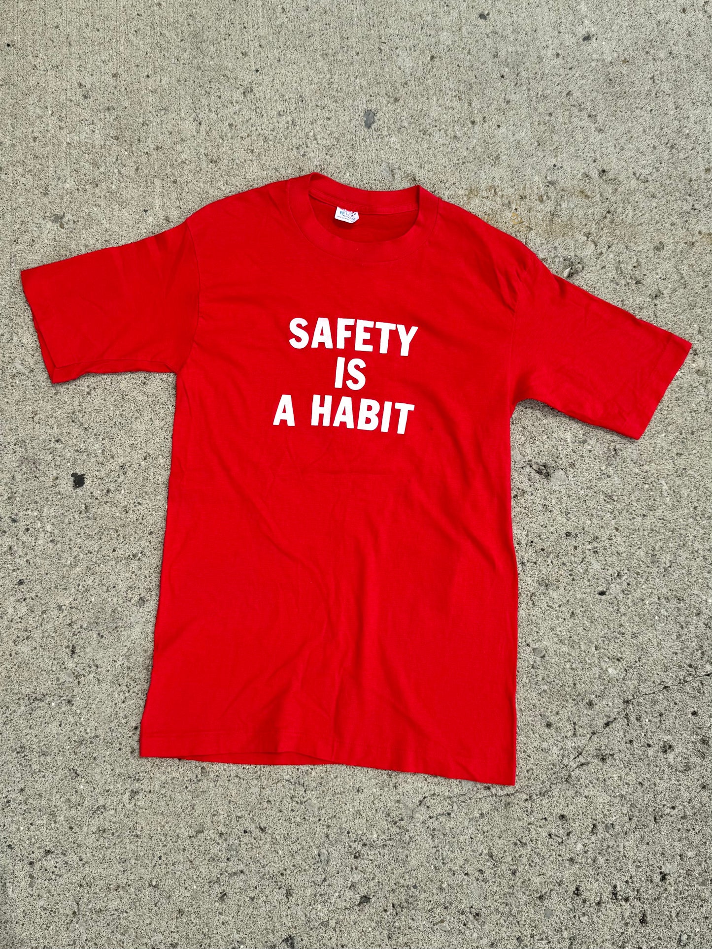 Vintage 1980s Firestone "Safety is a Habit" Red Graphic Tee | Medium