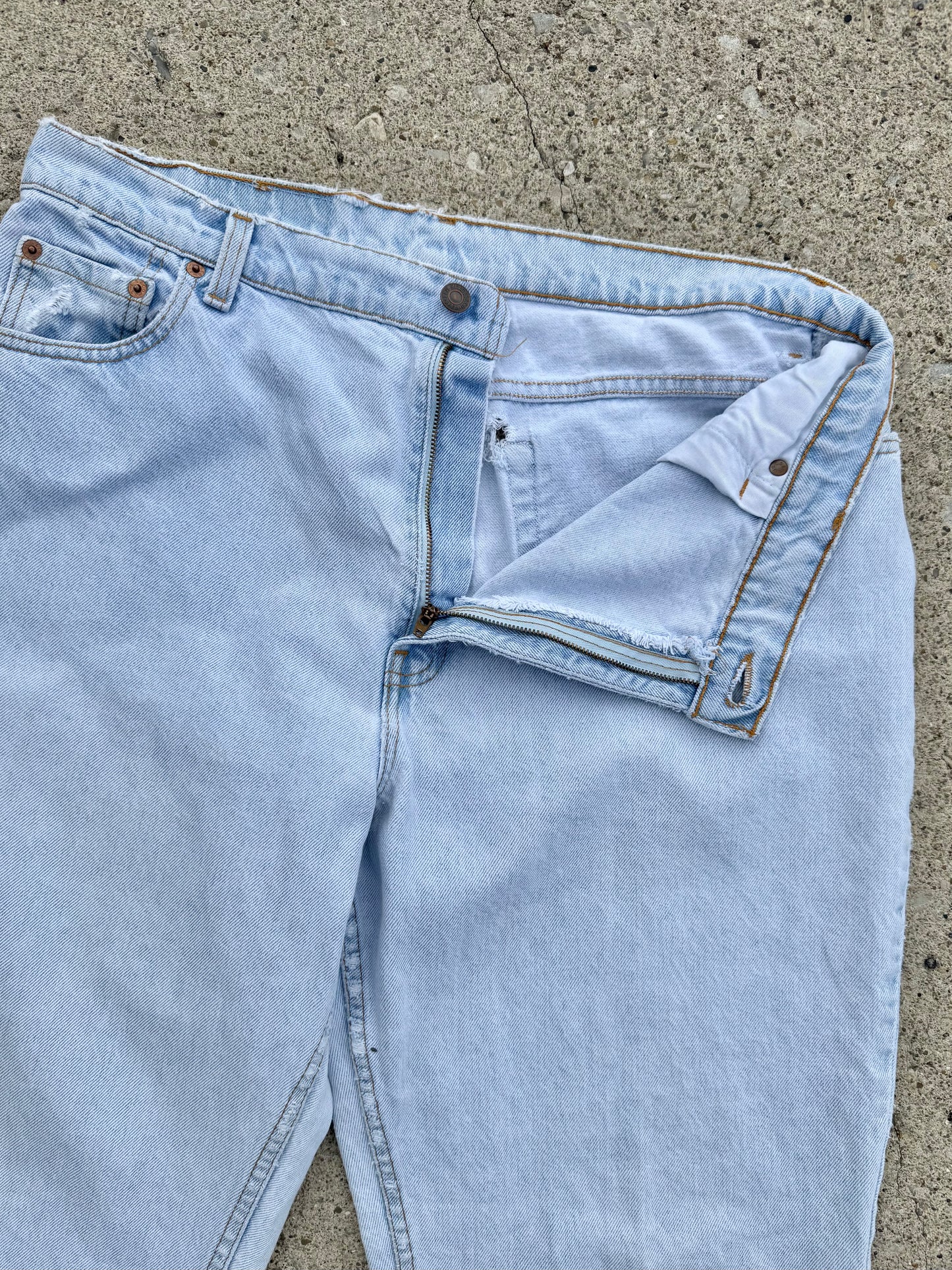 Vintage 1990s Levi’s 551 Distressed Light Wash Jeans | Waist 36”