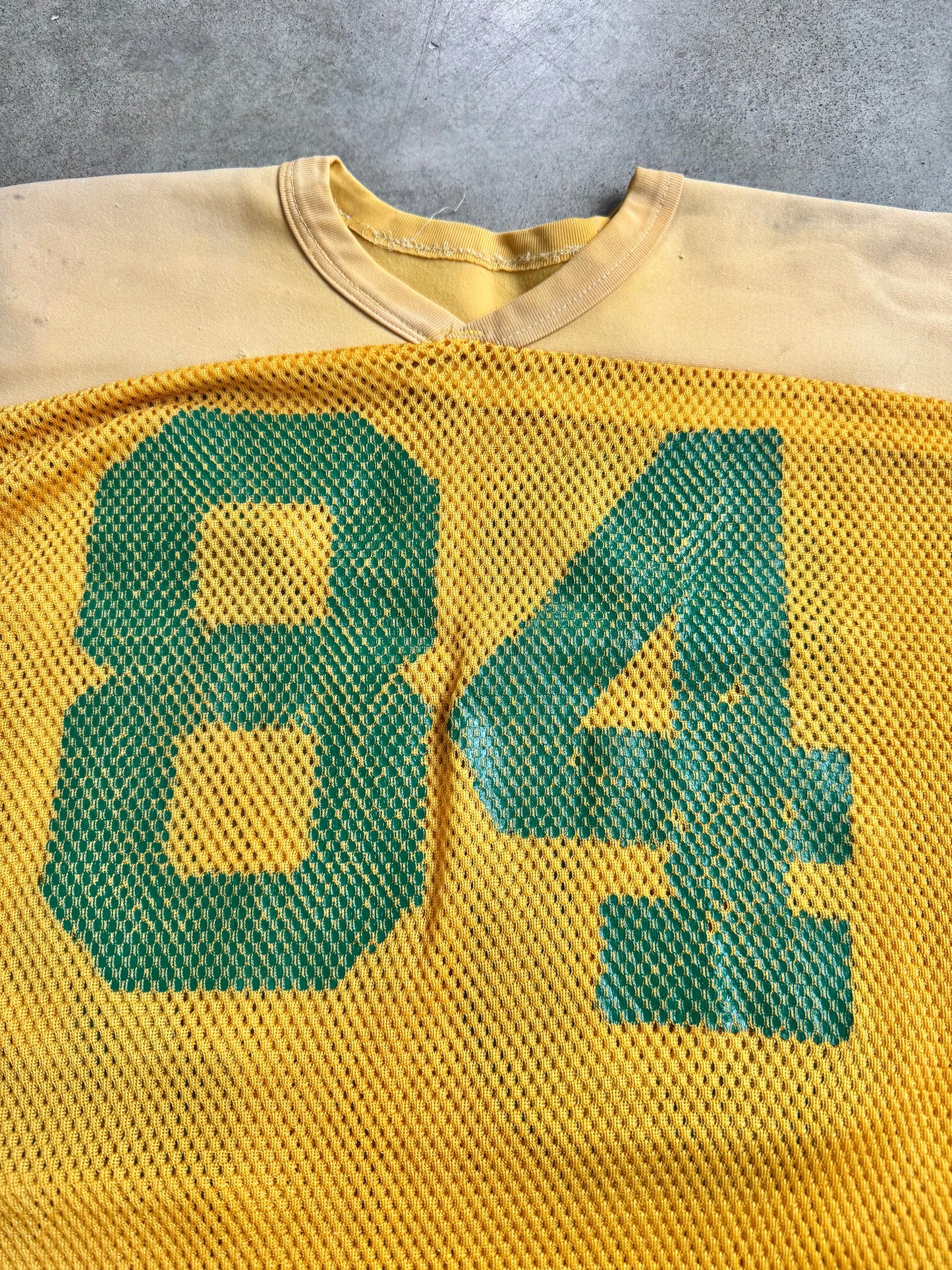 Vintage 1970s Yellow & Green #84 Distressed Mesh Football Jersey | L/XL