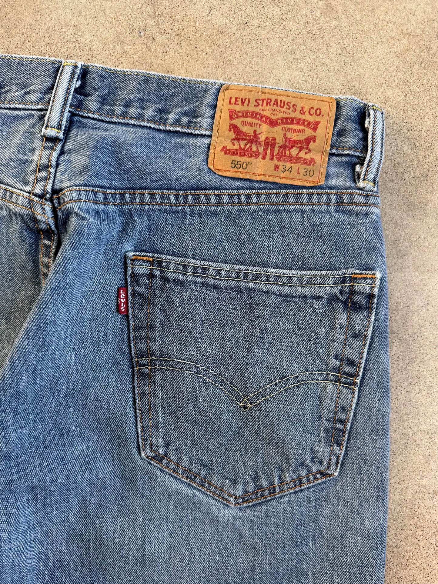 Levi's 550 Relaxed Fit Faded Medium Wash Jeans | 34x30