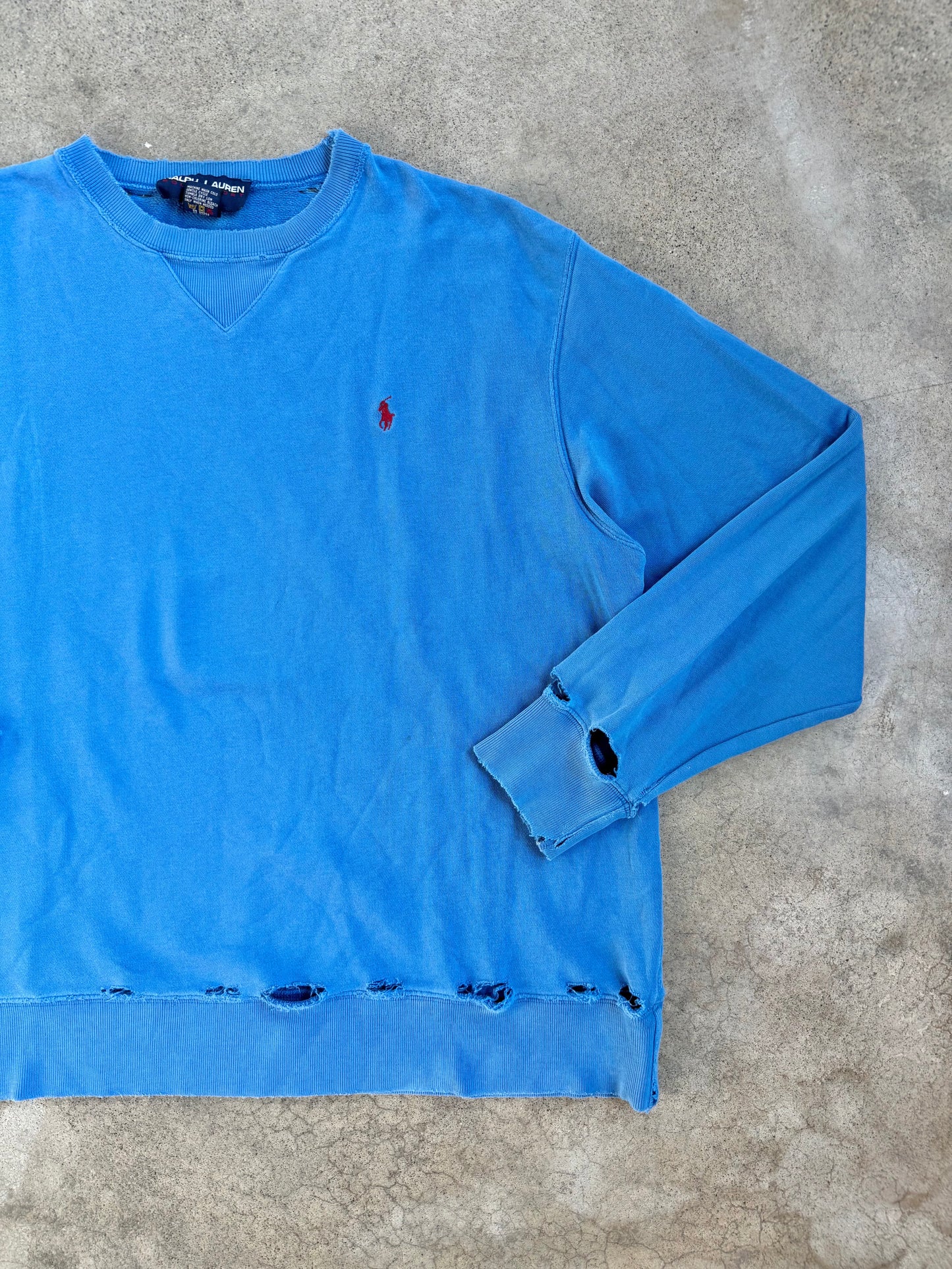 Vintage 1990s Polo Ralph Lauren Blue Distressed Crewneck Sweatshirt | Large