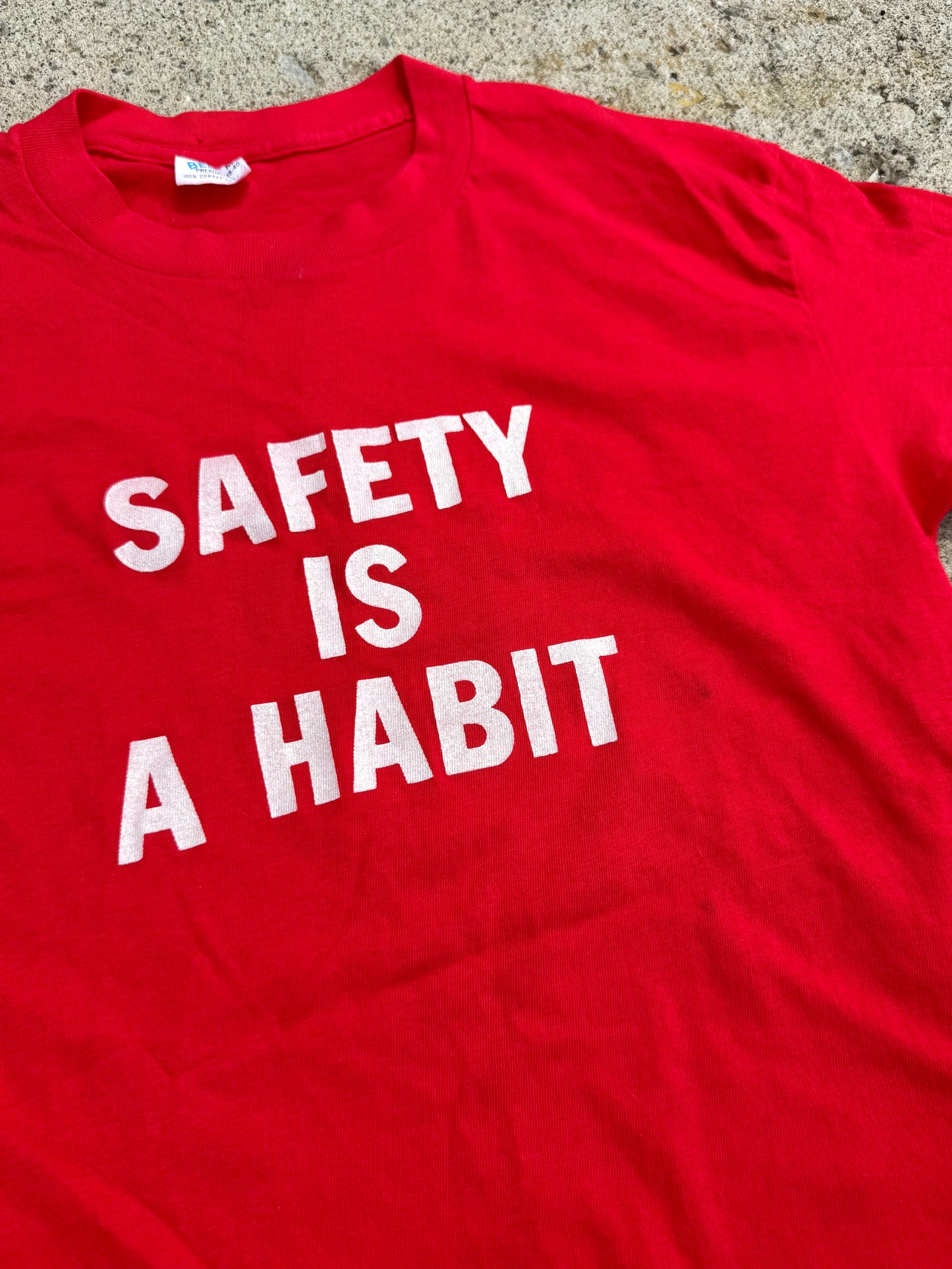 Vintage 1980s Firestone "Safety is a Habit" Red Graphic Tee | Medium