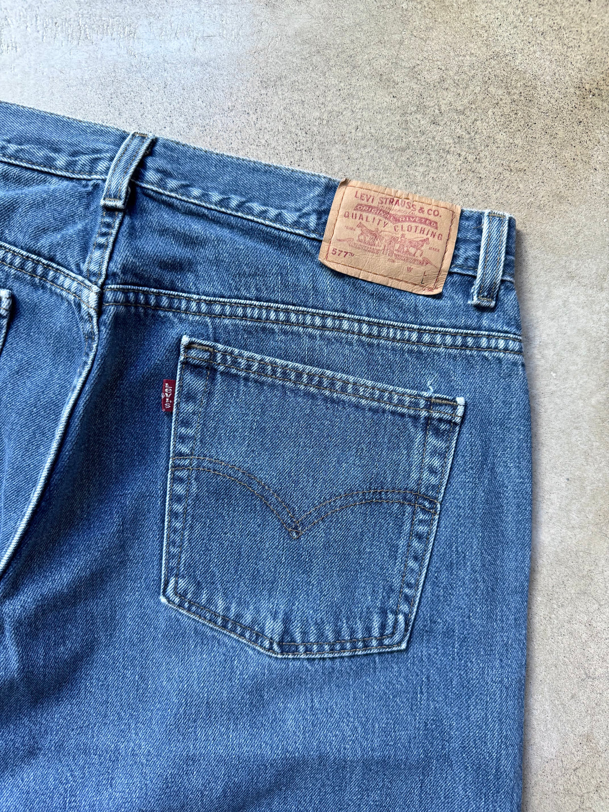 Vintage 1990s Levi’s 577 Loose Fit Faded Medium Wash Jeans | Waist 36”