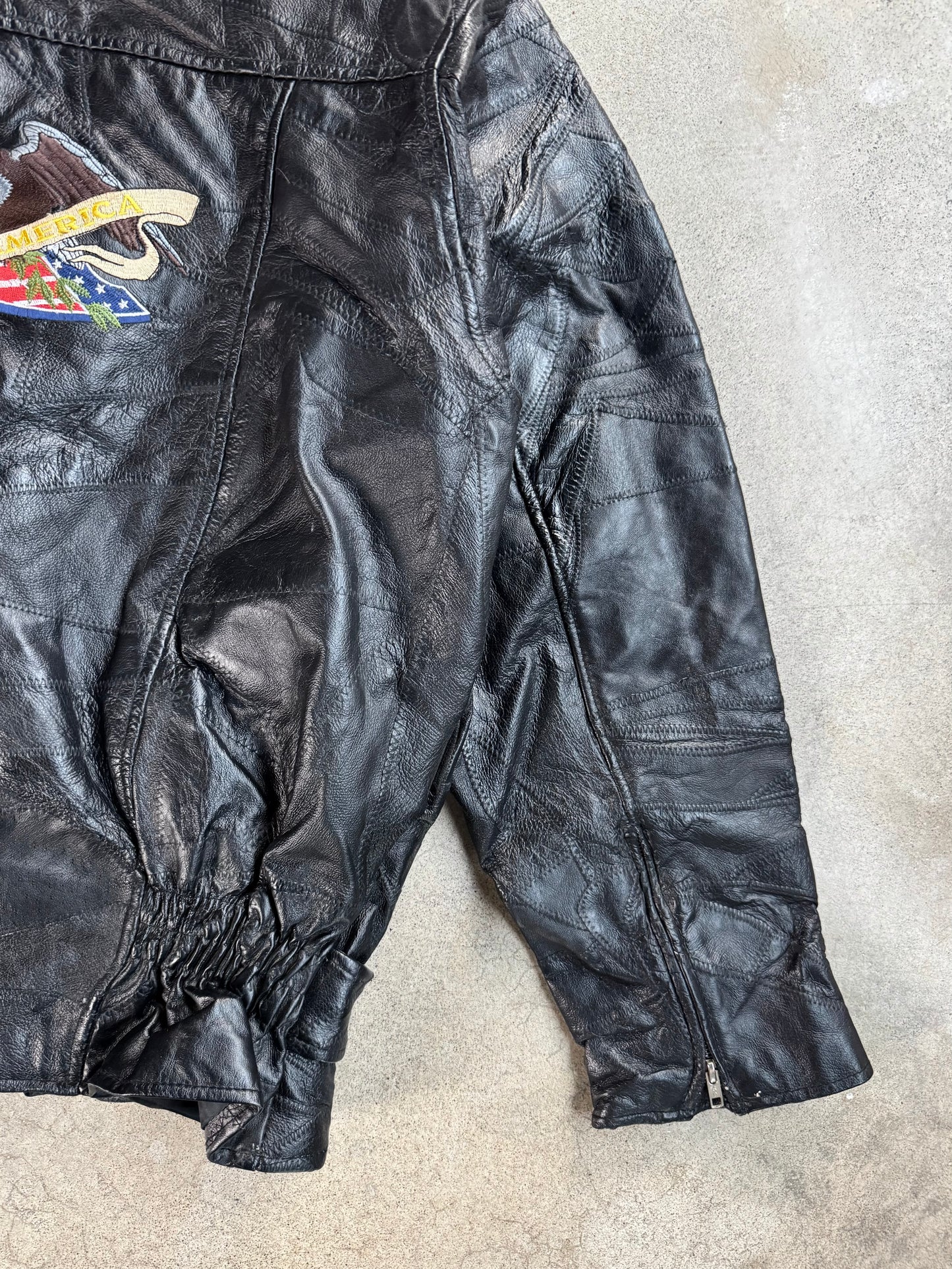 Vintage 1970s Black Leather Patchwork "God Bless America" Biker Jacket | XXL