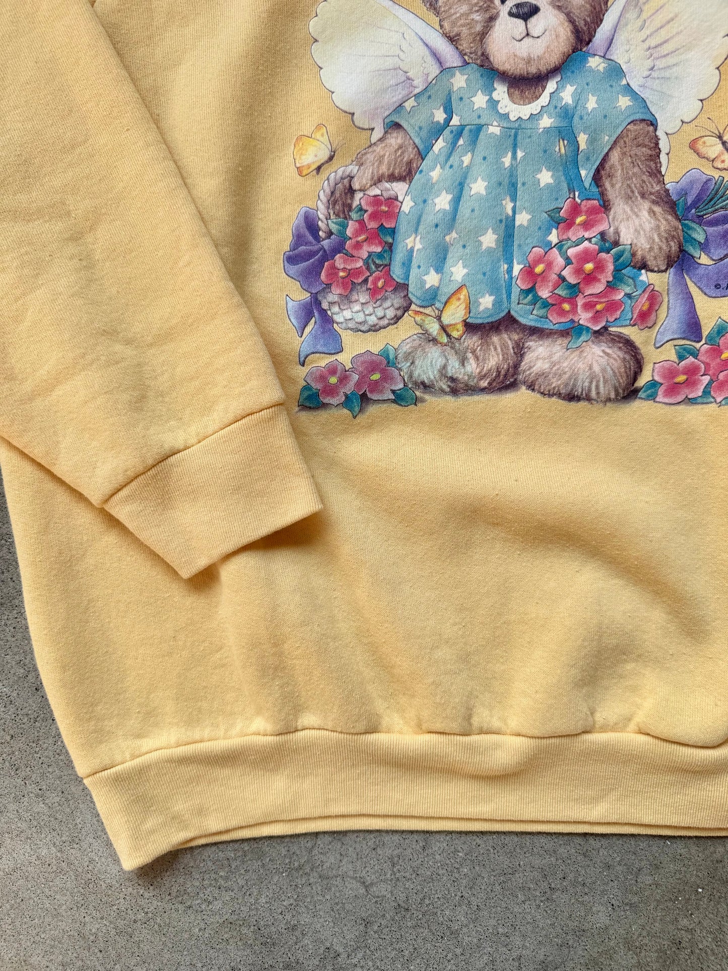 Vintage 1990s Yellow “Beary Good” Teddy Bear Angel Graphic Raglan Sweatshirt | XL