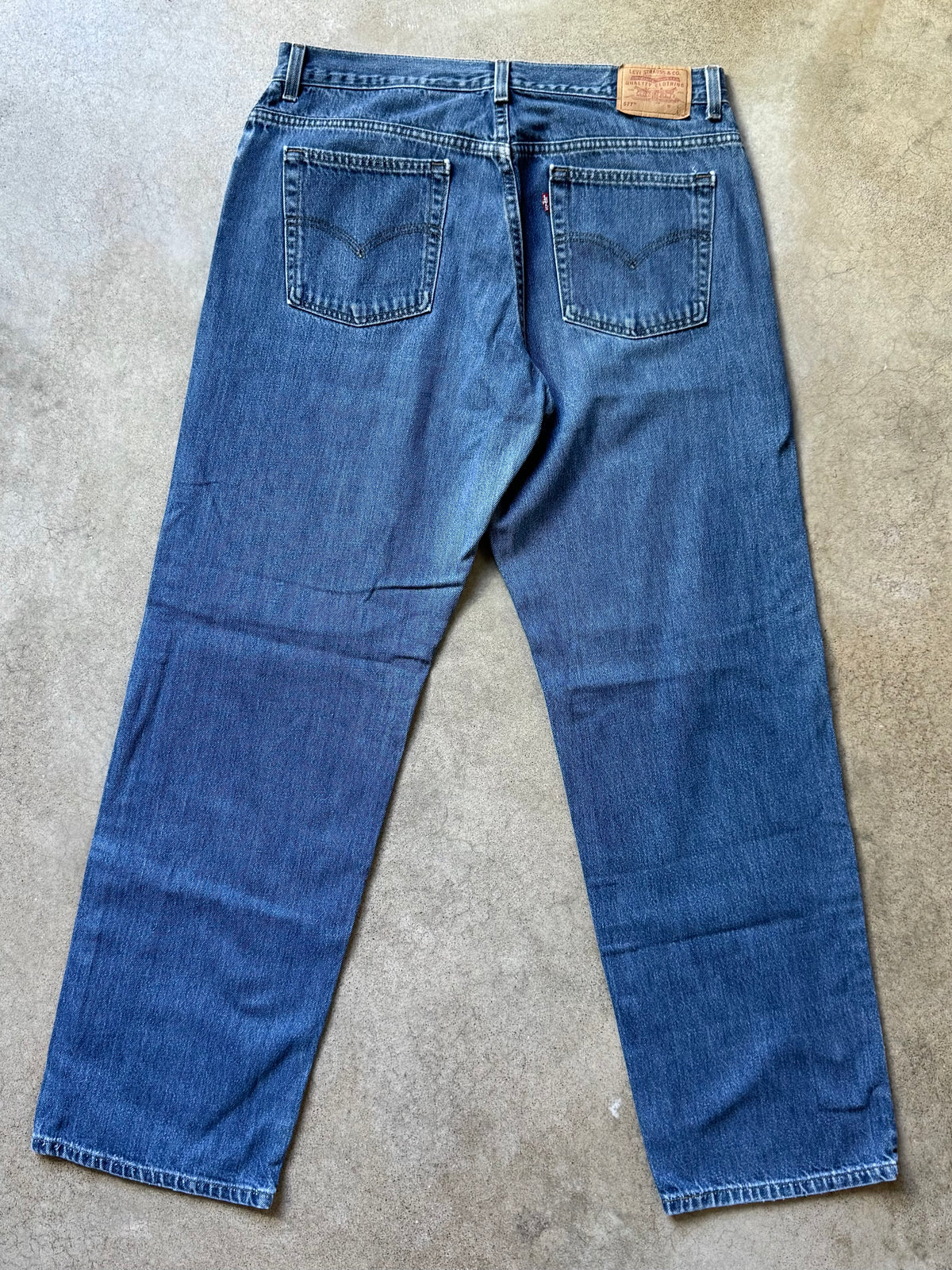 Vintage 1990s Levi’s 577 Loose Fit Faded Medium Wash Jeans | Waist 36”