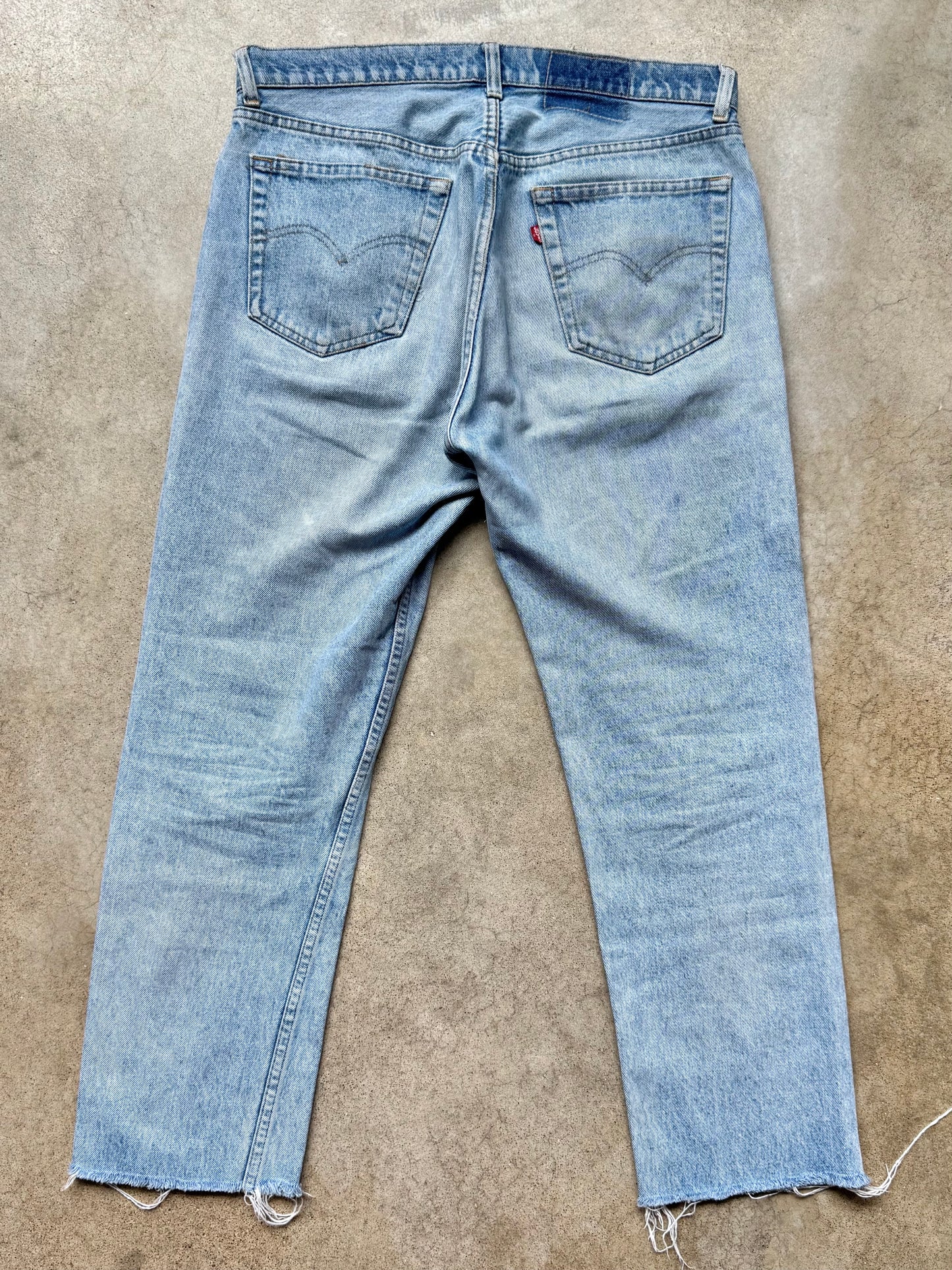 Vintage 1980s Levi’s Frayed Hem Light Wash Jeans | Waist 35”