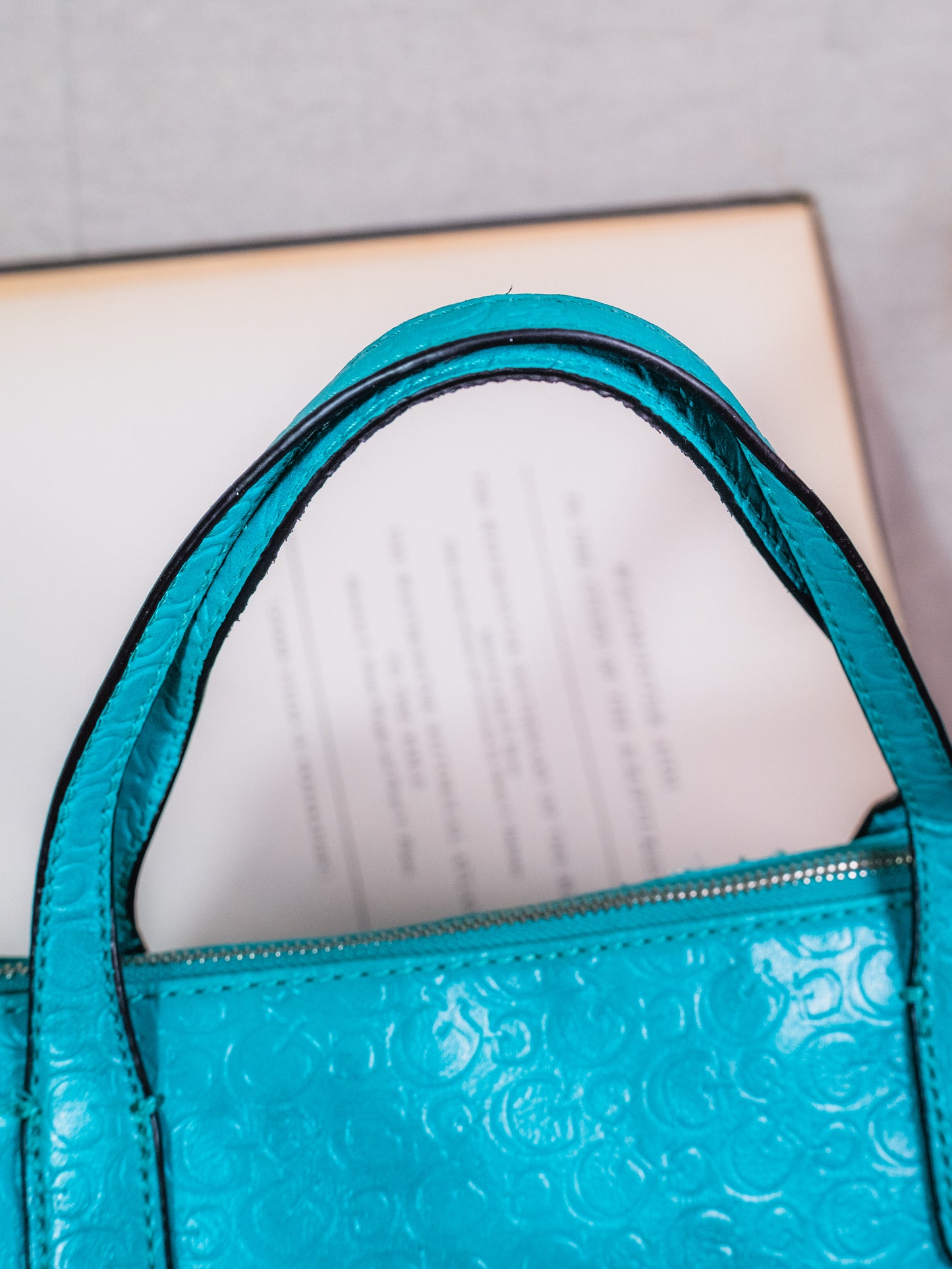 2000s Guess Turquoise Embossed Monogram Leather Top Handle Bag
