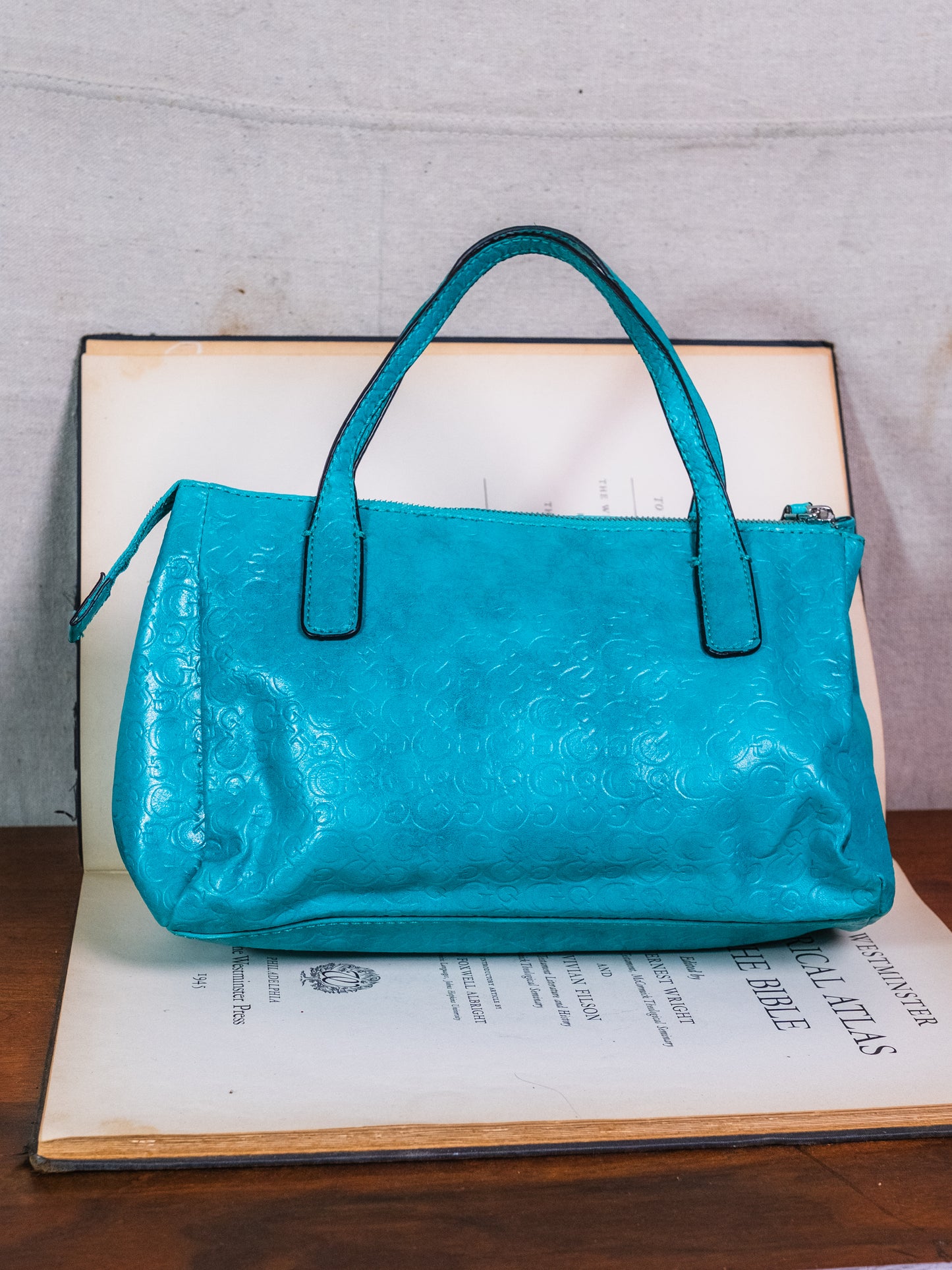 2000s Guess Turquoise Embossed Monogram Leather Top Handle Bag