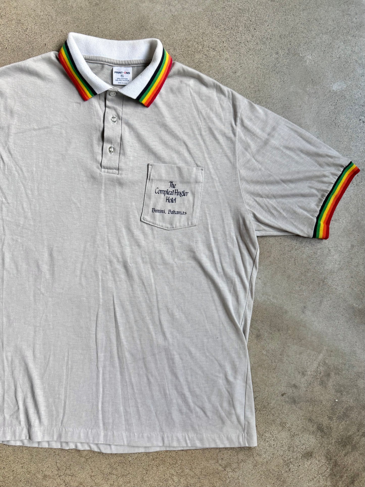 Vintage 1970s Bahamas Compleat Angler Hotel Rainbow Collar Polo Shirt | XL