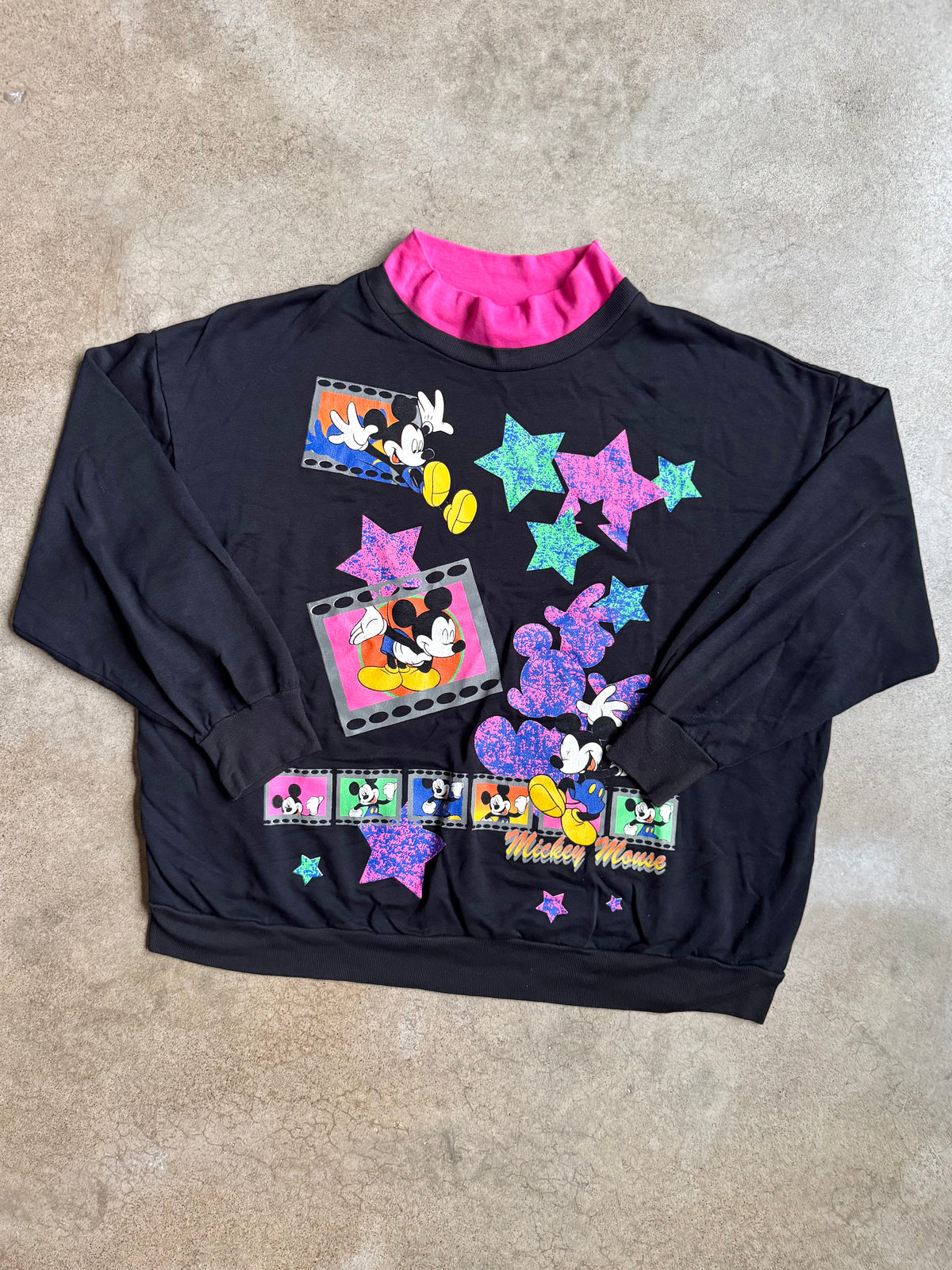 Vintage 1990s Mickey Unlimited Land ‘N Sea Mock Neck Film Strip Graphic Sweatshirt | XXL