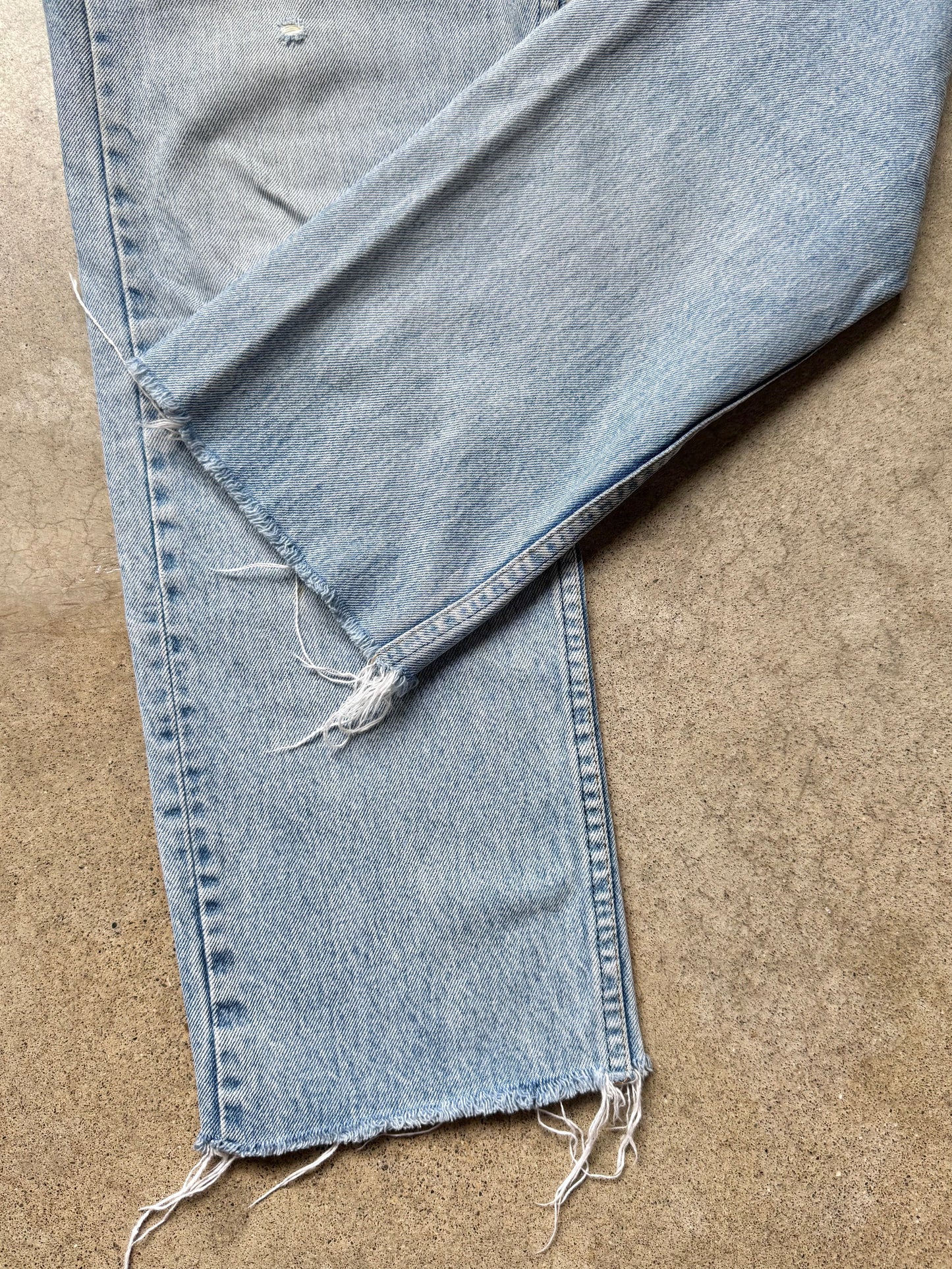 Vintage 1980s Levi’s Frayed Hem Light Wash Jeans | Waist 35”