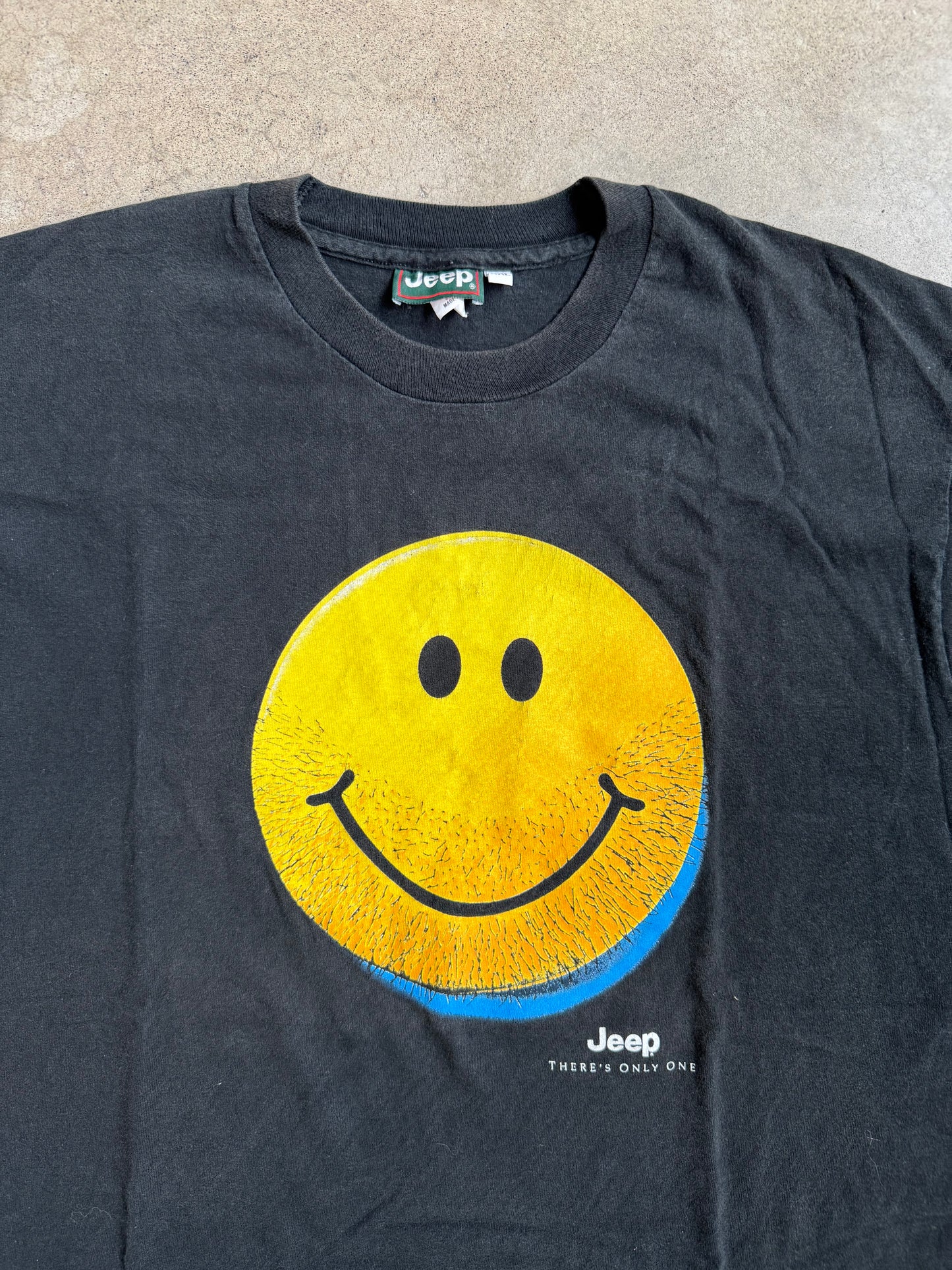 Vintage 1990s Jeep "There's Only One" Stubble Smiley Face Graphic Tee | XXL