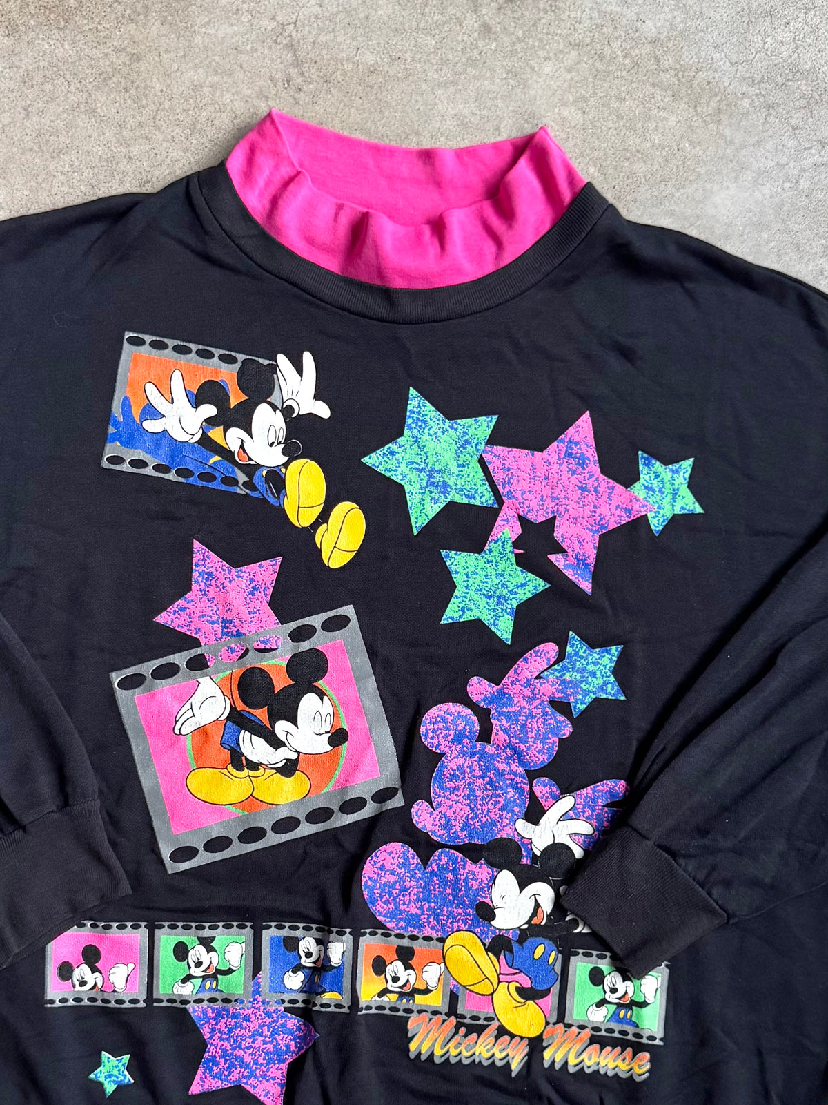 Vintage 1990s Mickey Unlimited Land ‘N Sea Mock Neck Film Strip Graphic Sweatshirt | XXL