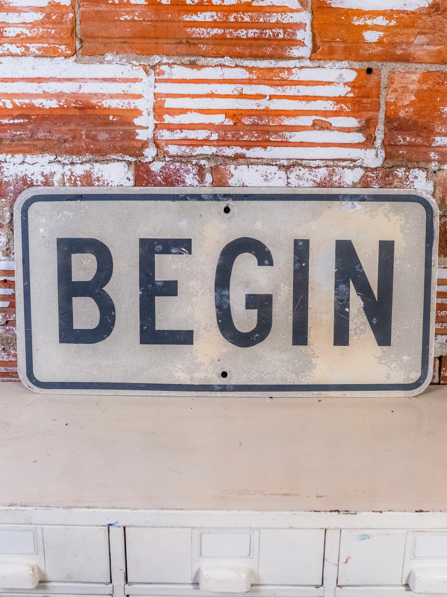 Vintage Metal Begin Road Sign