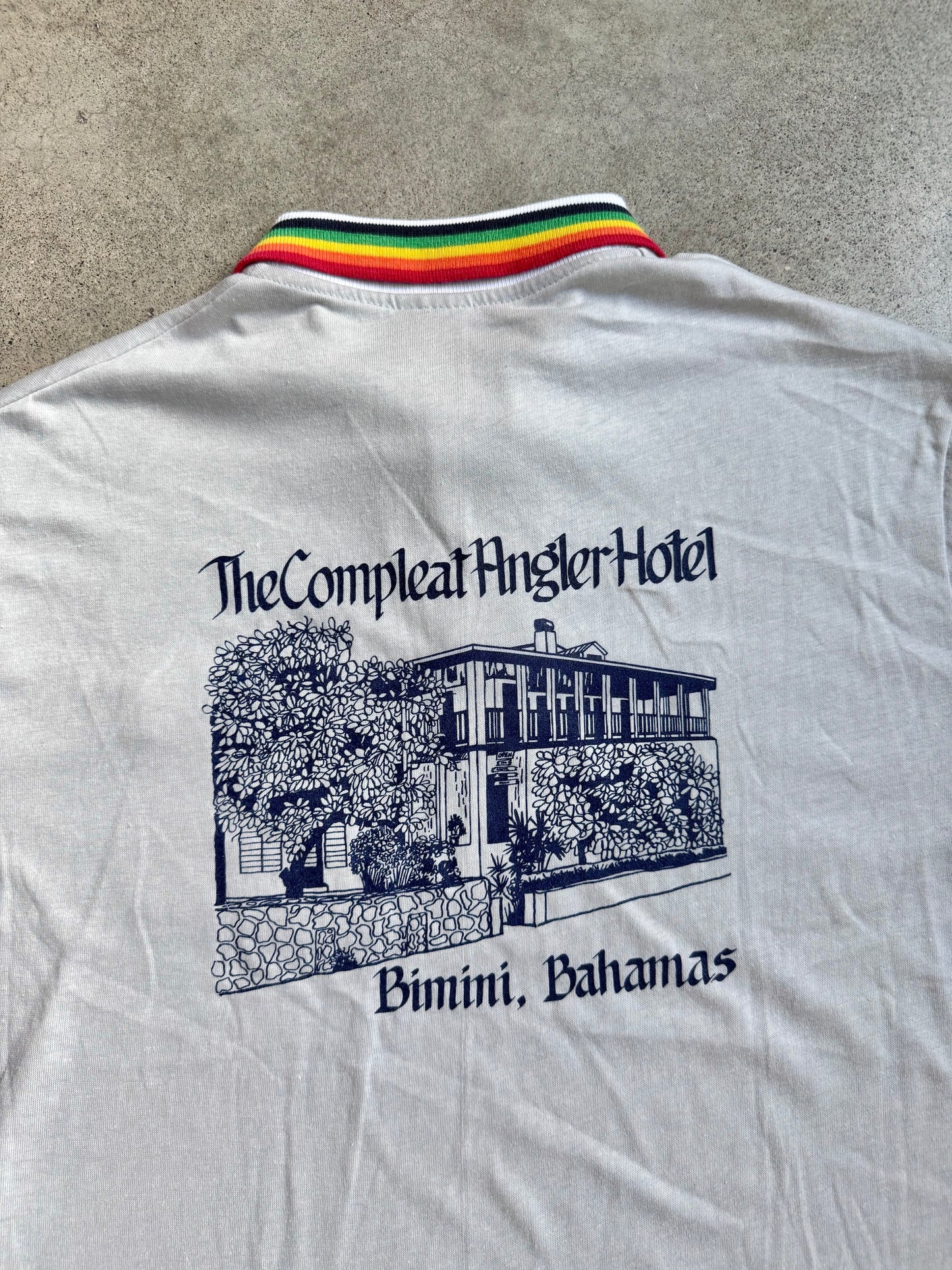 Vintage 1970s Bahamas Compleat Angler Hotel Rainbow Collar Polo Shirt | XL