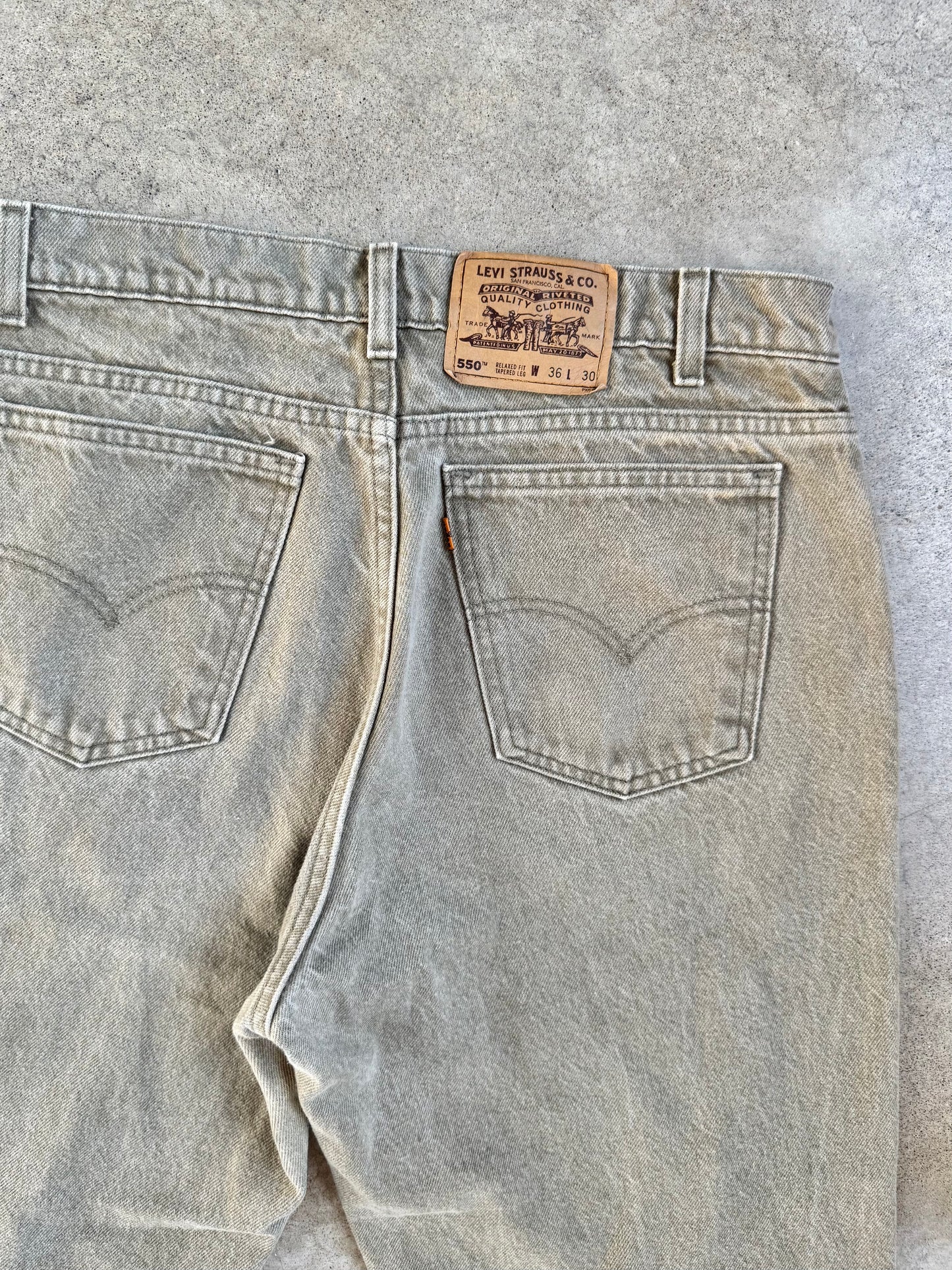 Vintage 1990s Levi’s Orange Tab 550 Relaxed Fit Muted Green Jeans | 36x30
