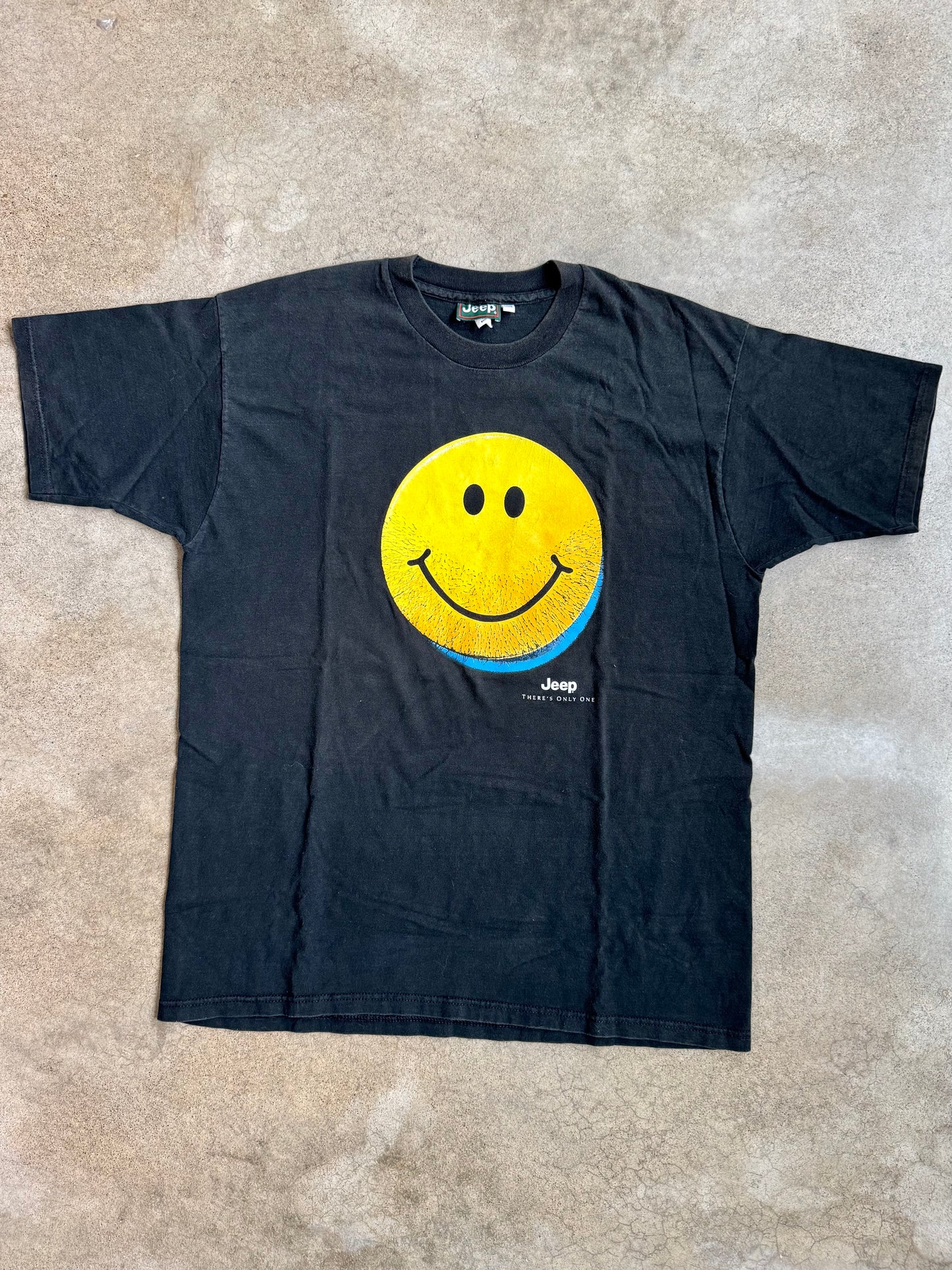 Vintage 1990s Jeep "There's Only One" Stubble Smiley Face Graphic Tee | XXL