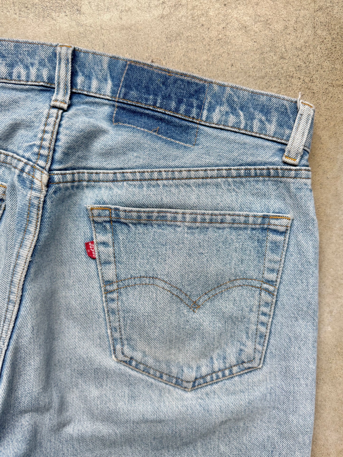 Vintage 1980s Levi’s Frayed Hem Light Wash Jeans | Waist 35”