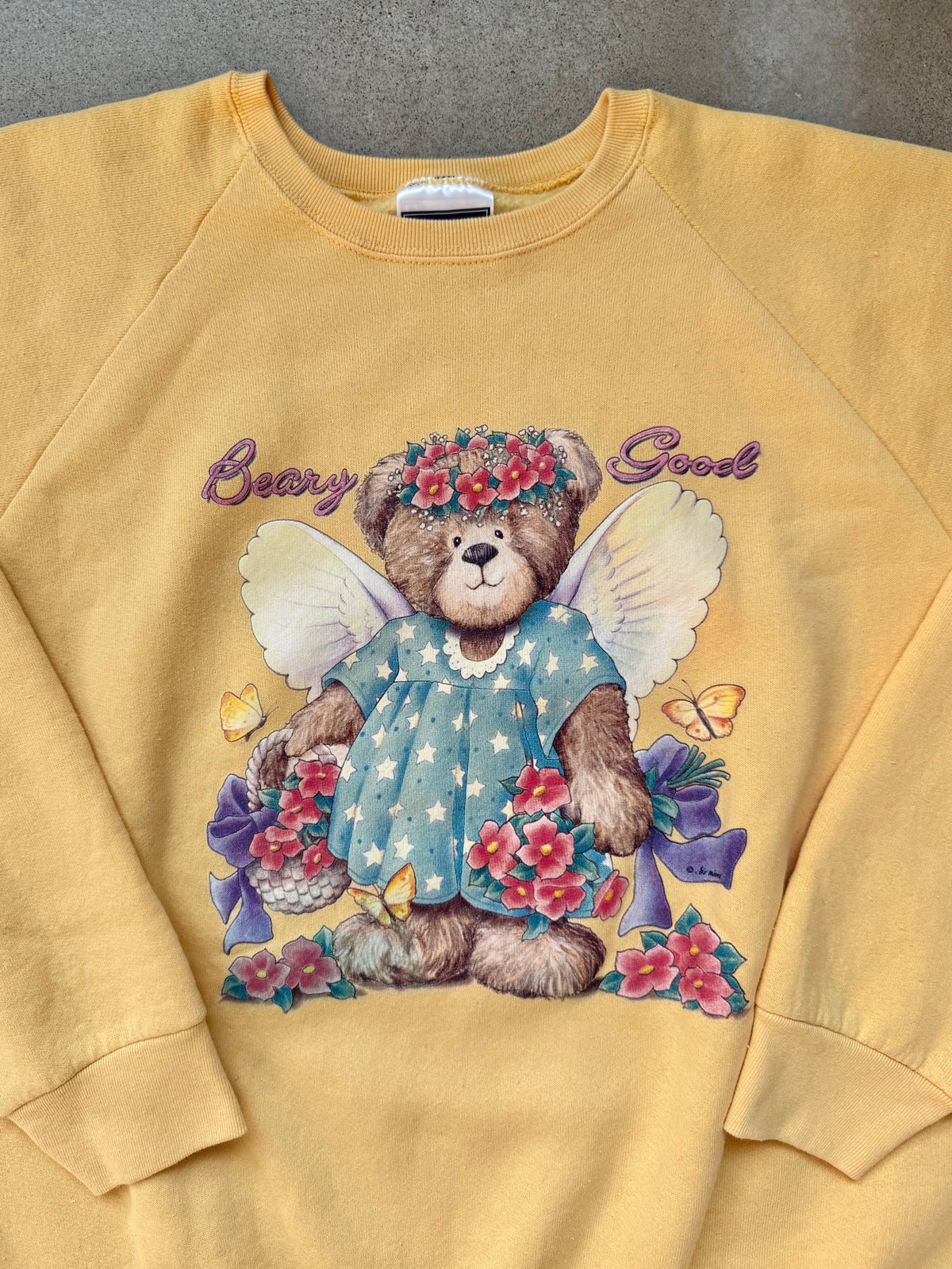 Vintage 1990s Yellow “Beary Good” Teddy Bear Angel Graphic Raglan Sweatshirt | XL