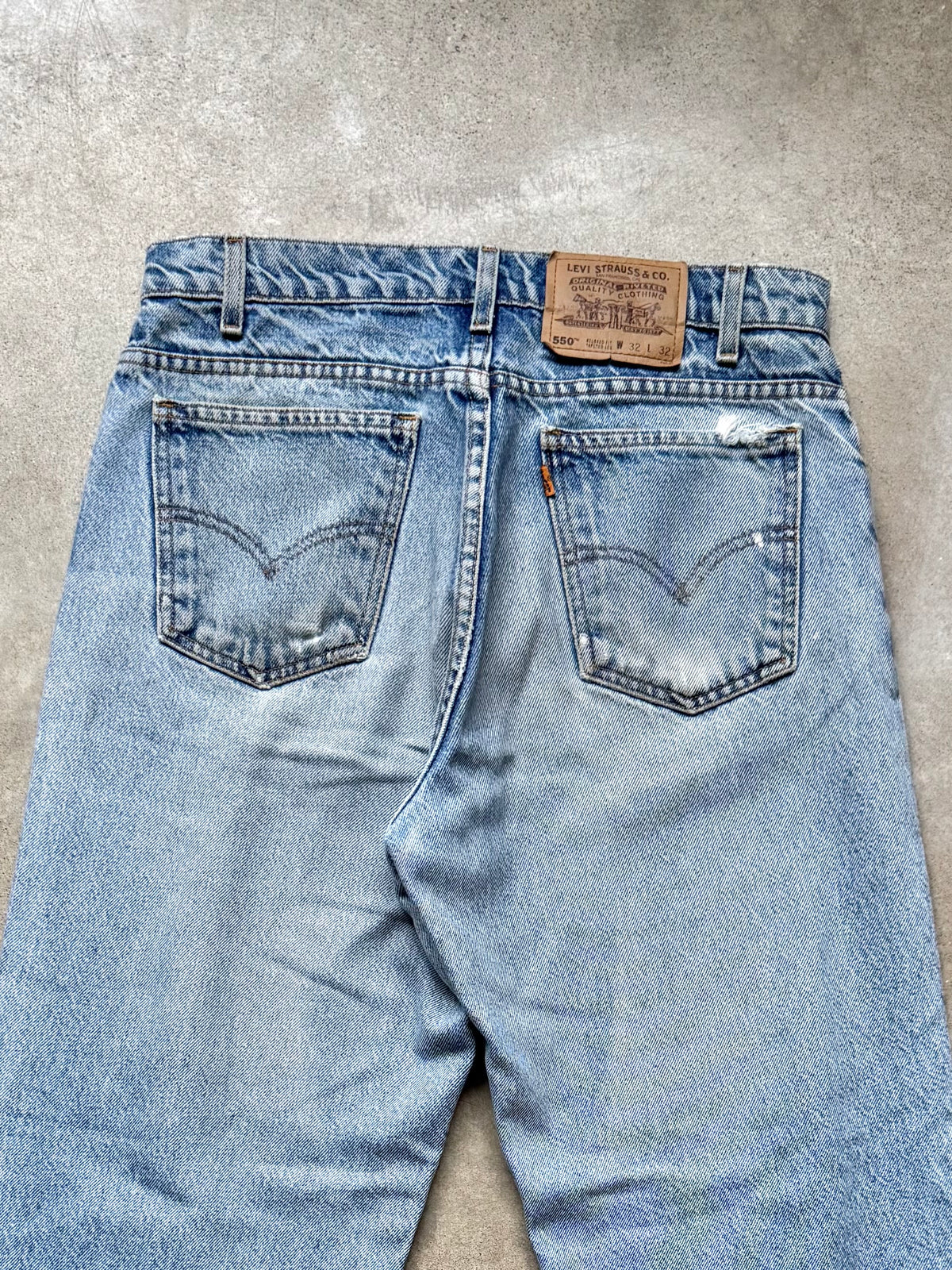 Vintage 1990s Levi’s Orange Tab 550 Relaxed Fit Light Wash Jeans | 32x32
