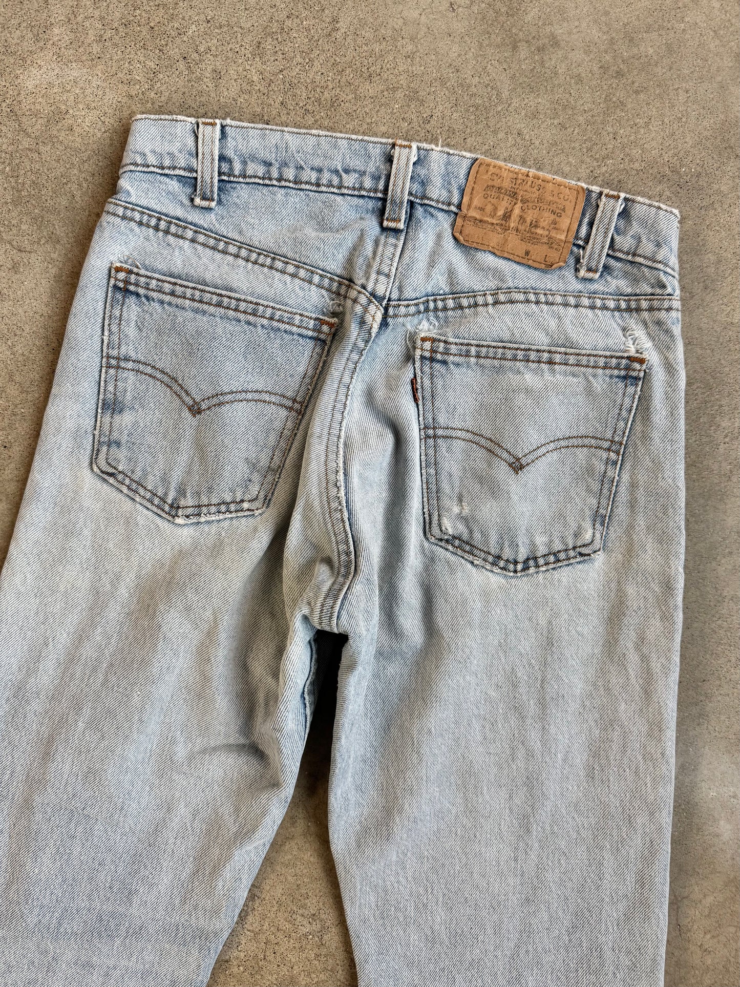 Vintage 1990s Levi's Orange Tab Distressed Light Wash Jeans | 31x32