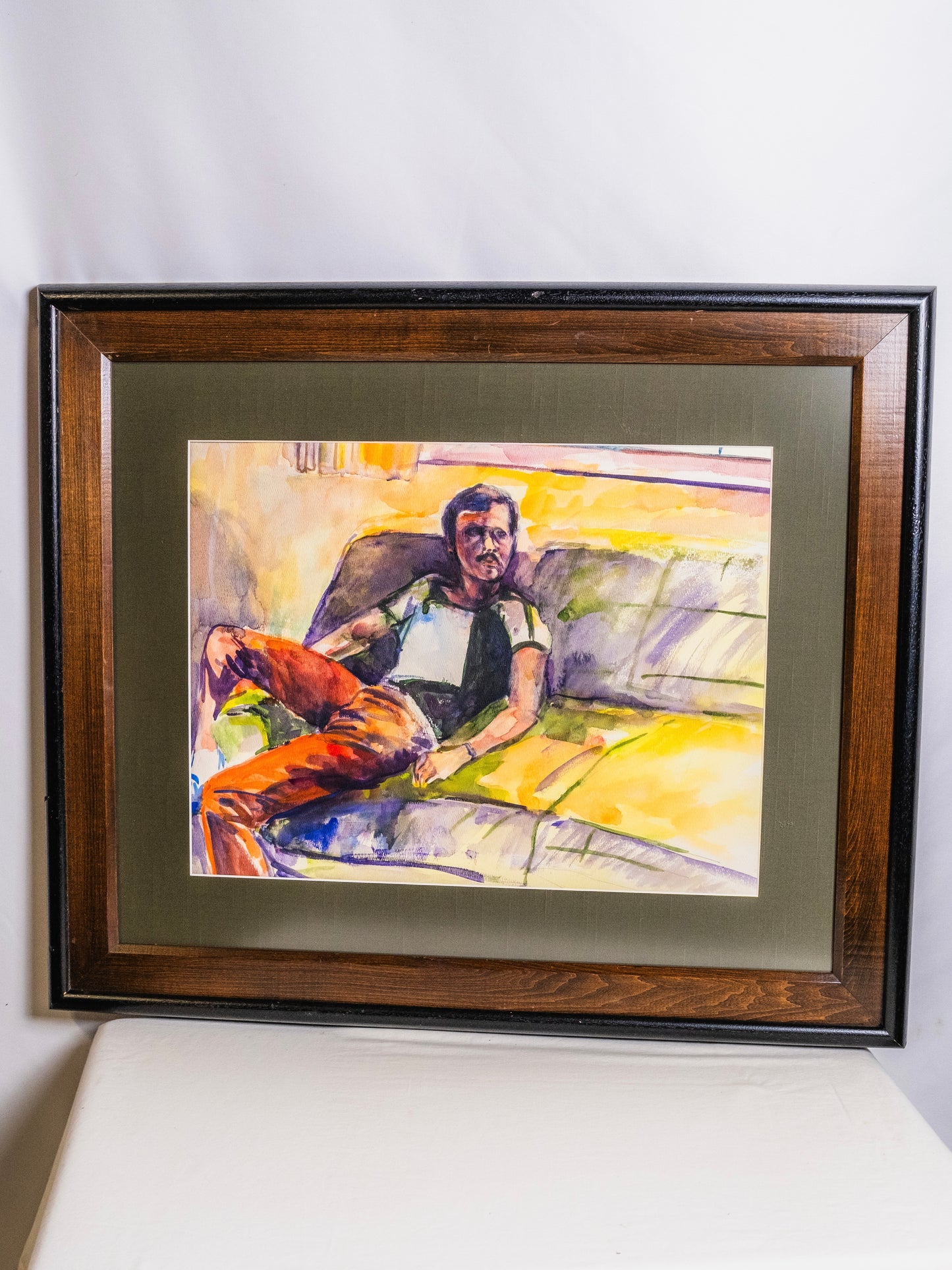 Framed "Man on Couch" Watercolor Artwork