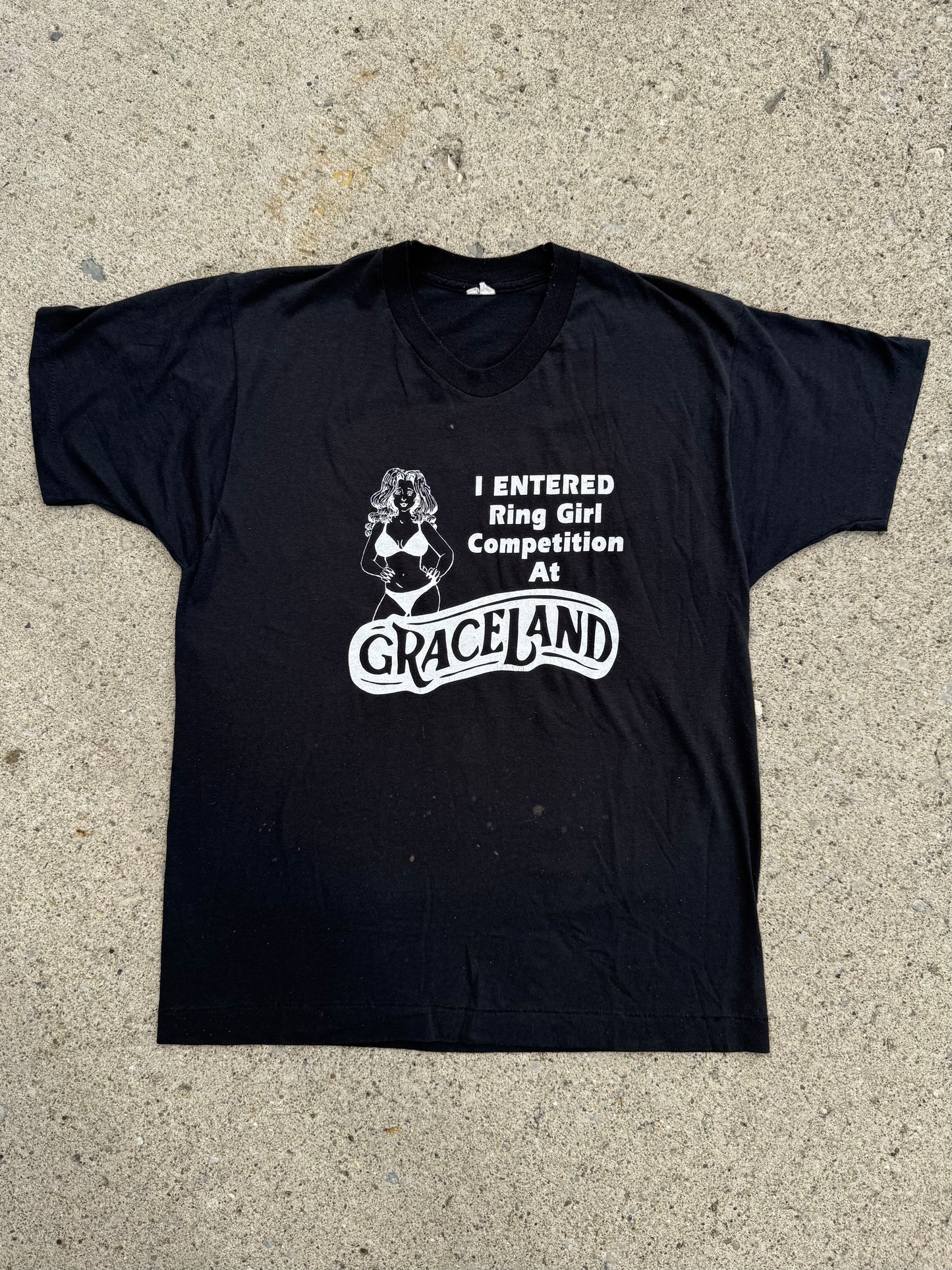 Vintage 1980s Graceland Ring Girl Competition Black Graphic Tee | Large