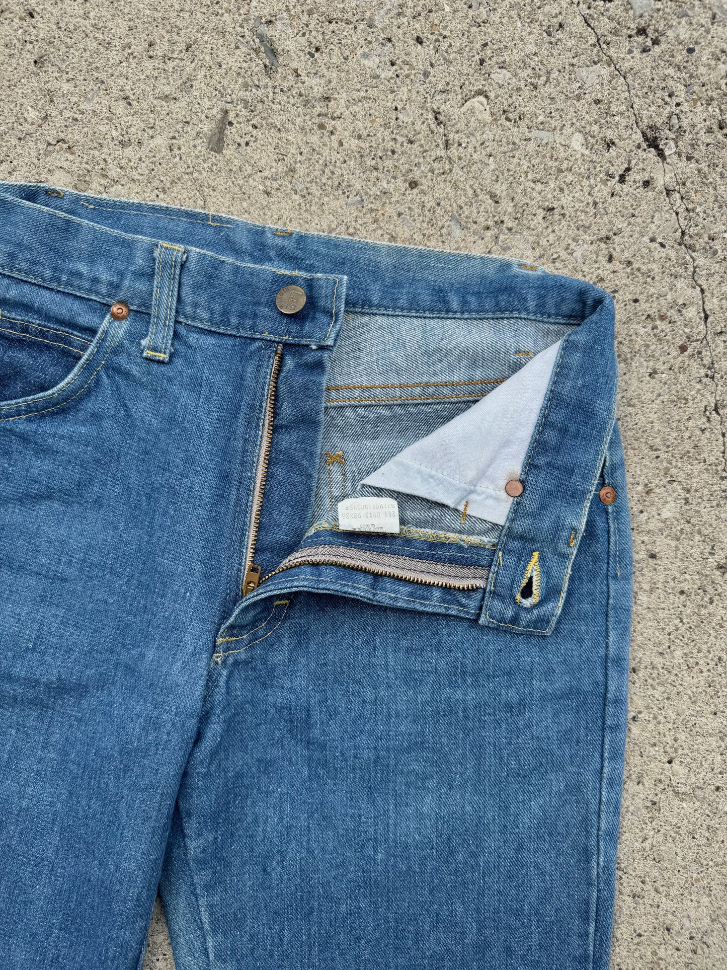 Vintage 1980s Lee Raw Hem Cuffed Jeans | Waist 28”