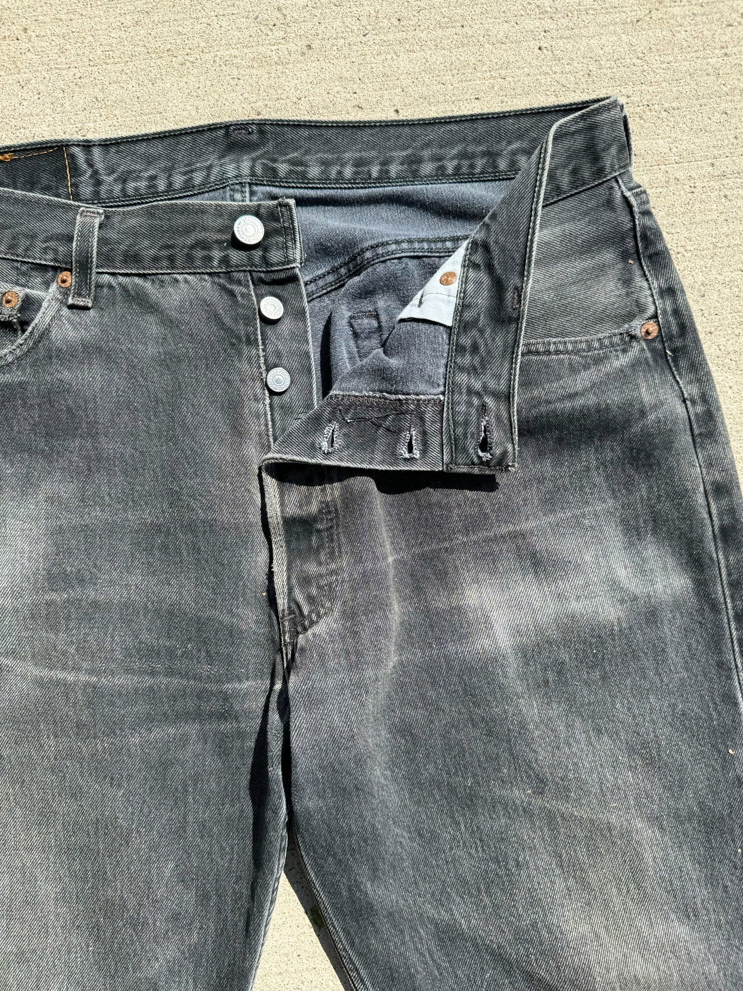 Vintage 1990s Levi’s 501 Washed Black Distressed Jeans