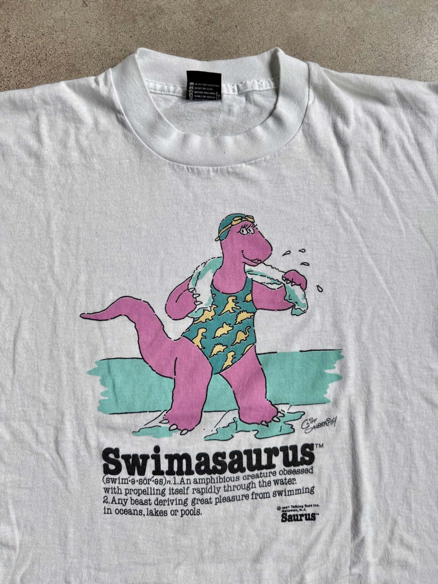 Vintage 1980s Cliff Galbraith “Swimasaurus” Graphic Tee | XL