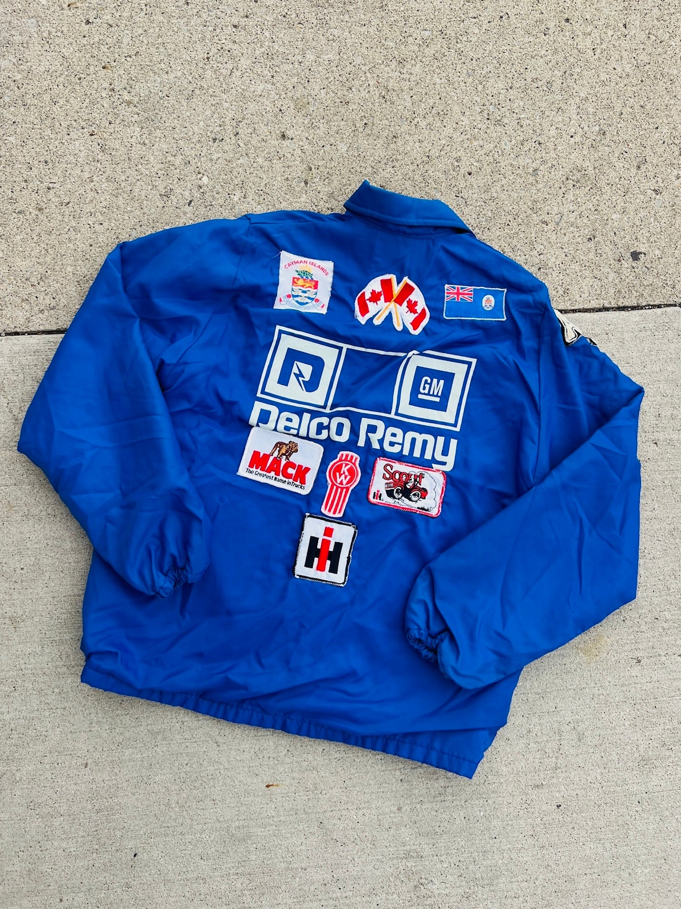 Vintage 1980s Delco Remy Patched Blue Nylon Jacket | Large