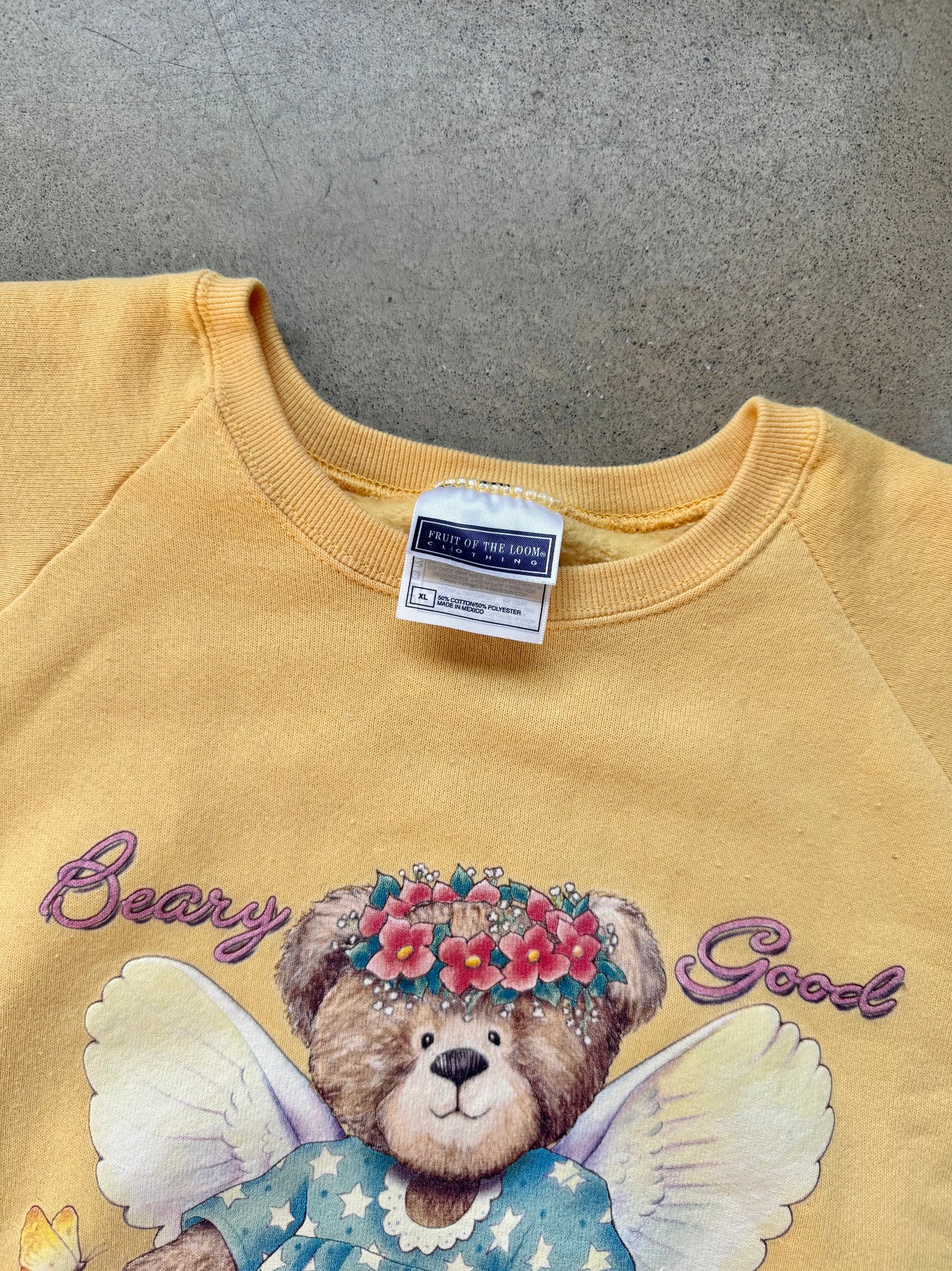 Vintage 1990s Yellow “Beary Good” Teddy Bear Angel Graphic Raglan Sweatshirt | XL