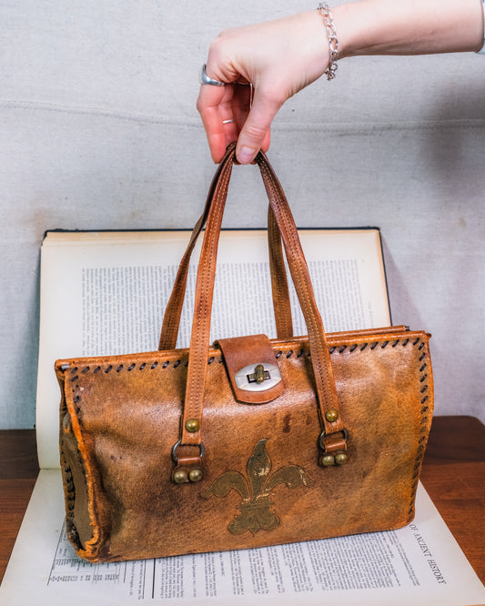 Vintage Distressed Italian Leather Fleur De Lis Emblem Handbag