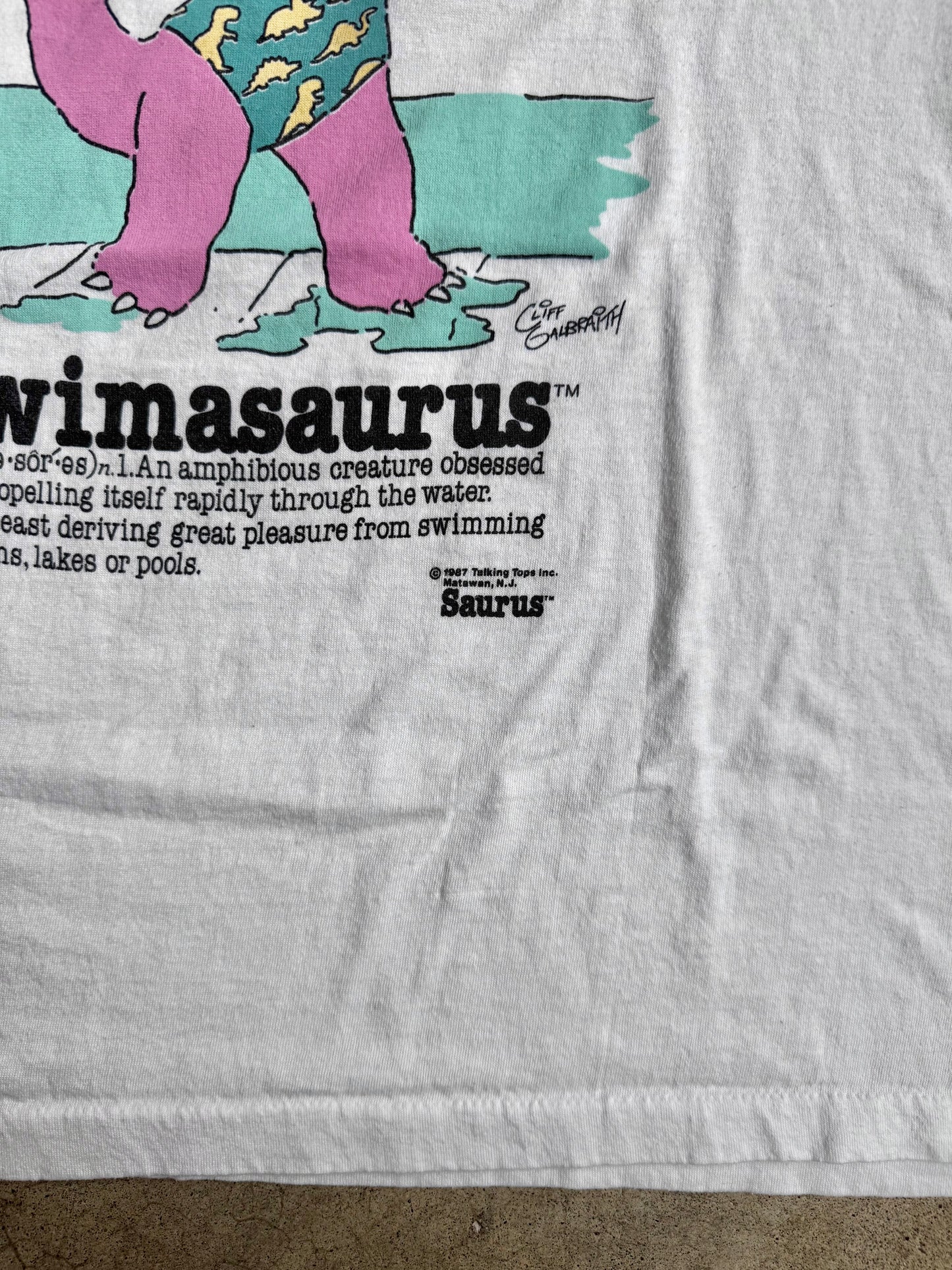 Vintage 1980s Cliff Galbraith “Swimasaurus” Graphic Tee | XL