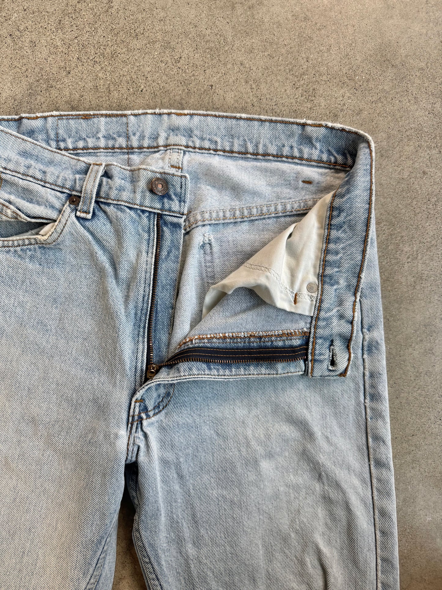 Vintage 1990s Levi's Orange Tab Distressed Light Wash Jeans | 31x32