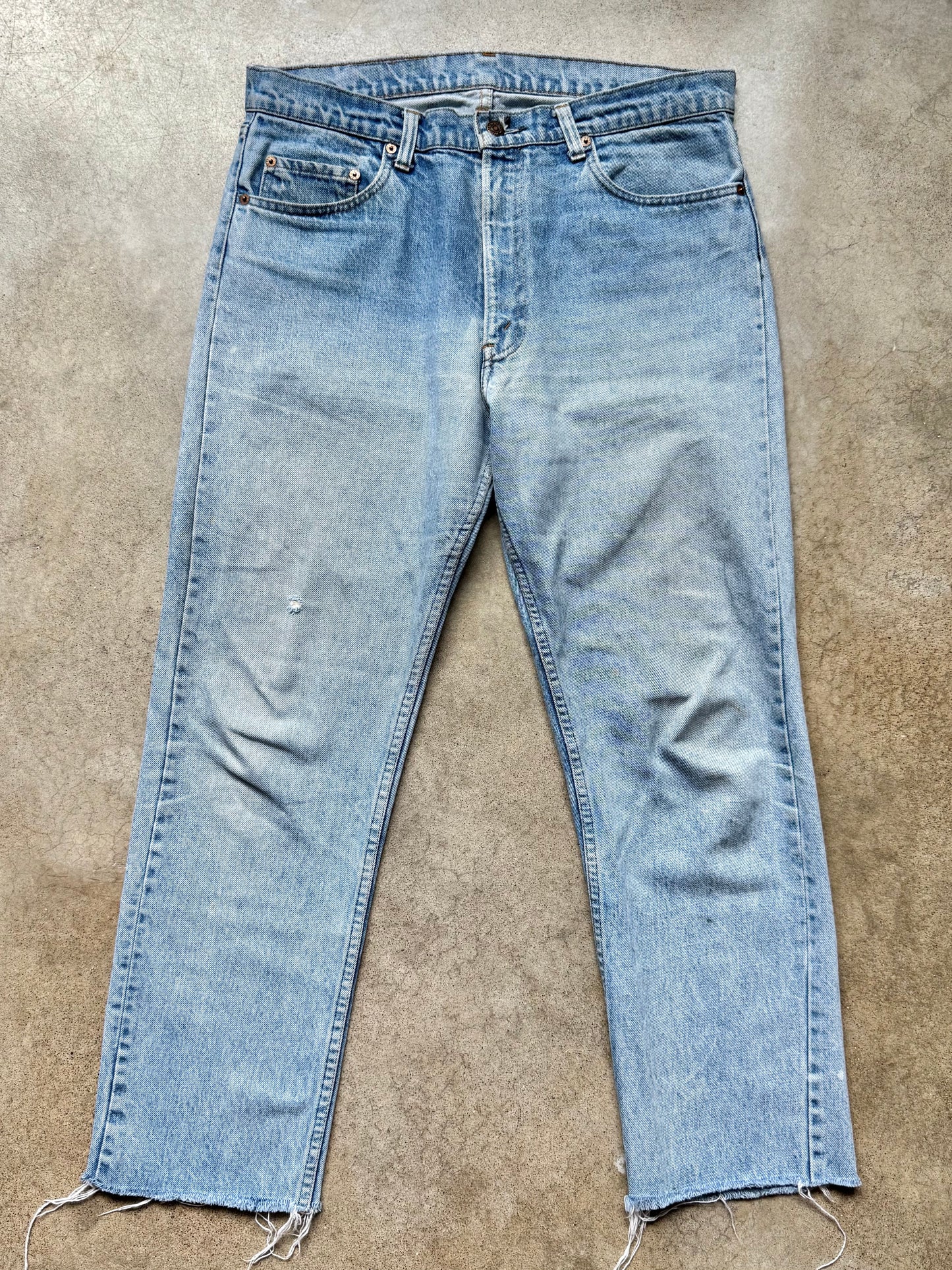Vintage 1980s Levi’s Frayed Hem Light Wash Jeans | Waist 35”