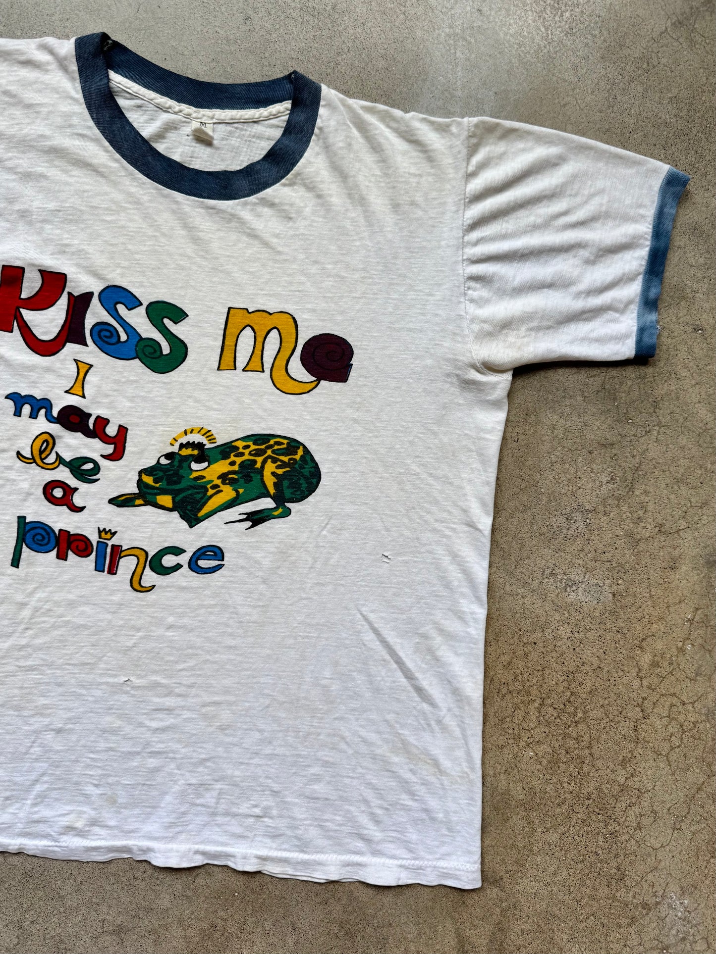 Vintage 1970s Distressed “Kiss Me I May Be A Prince” Graphic Ringer Tee | Medium