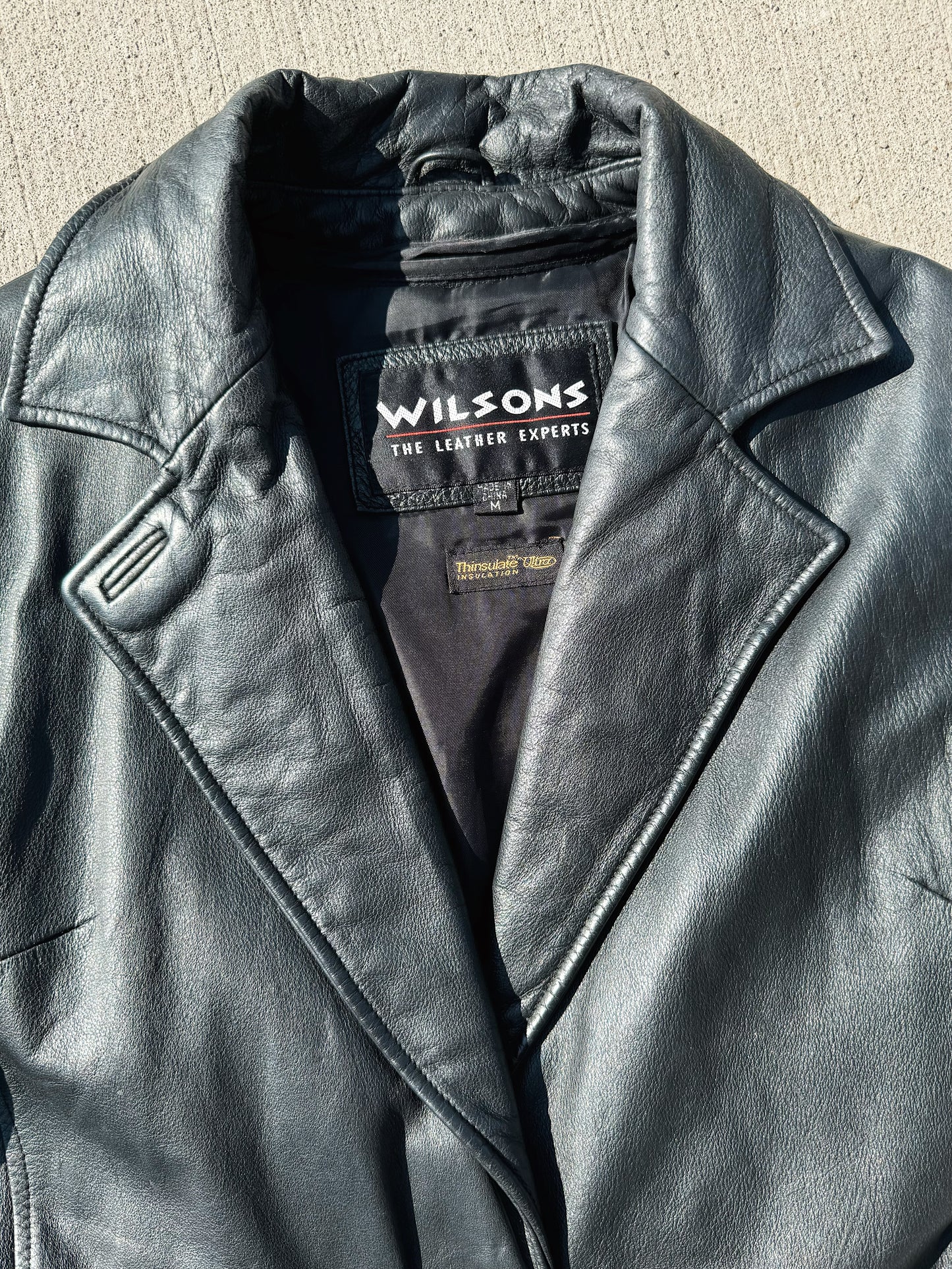 Vintage 1990s Wilson’s Tie Waist Black Leather Jacket | Medium