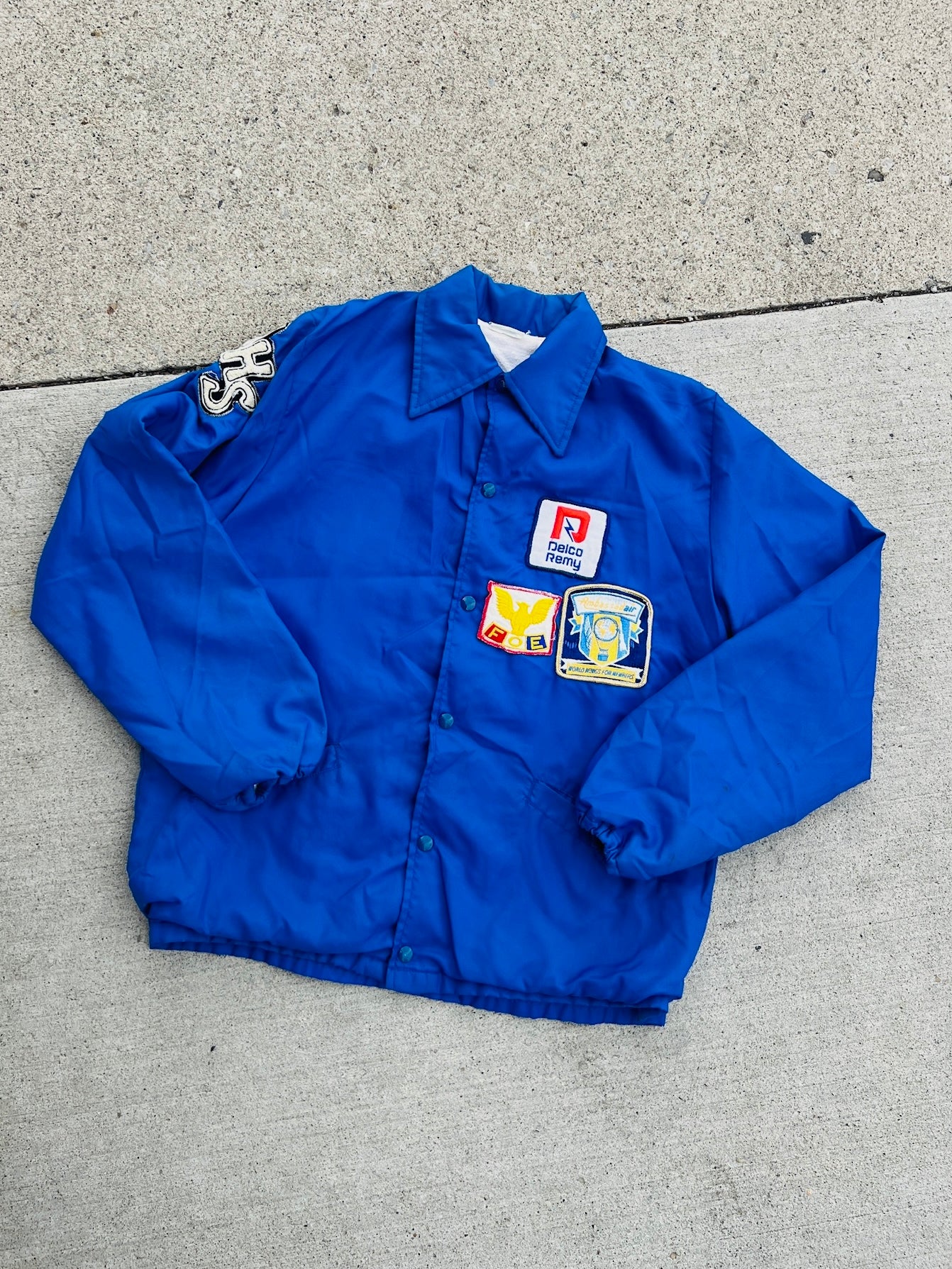 Vintage 1980s Delco Remy Patched Blue Nylon Jacket | Large