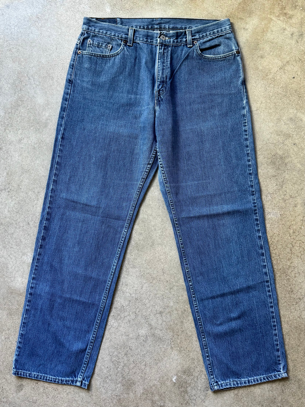 Vintage 1990s Levi’s 577 Loose Fit Faded Medium Wash Jeans | Waist 36”